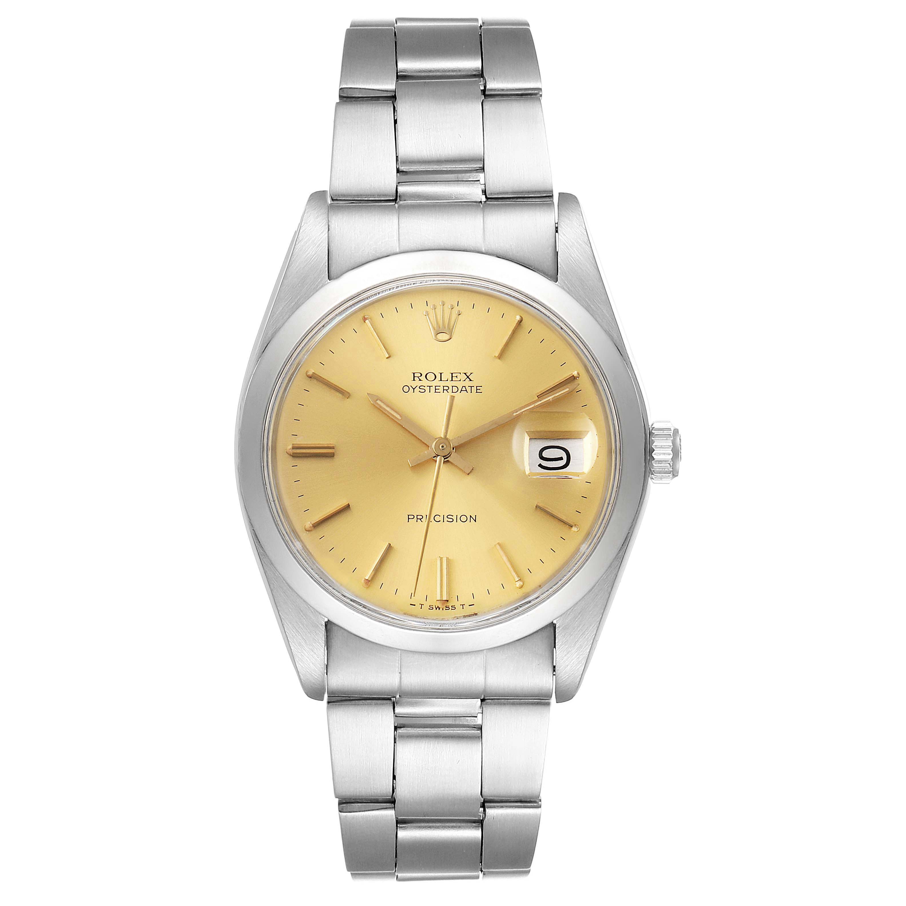 This image shows a front view of a Rolex Vintage Collection 6694 Men's Stainless Steel Champagne Dial 6694 Men's Stainless Steel Champagne Dial Oysterdate watch with a silver band and gold dial.