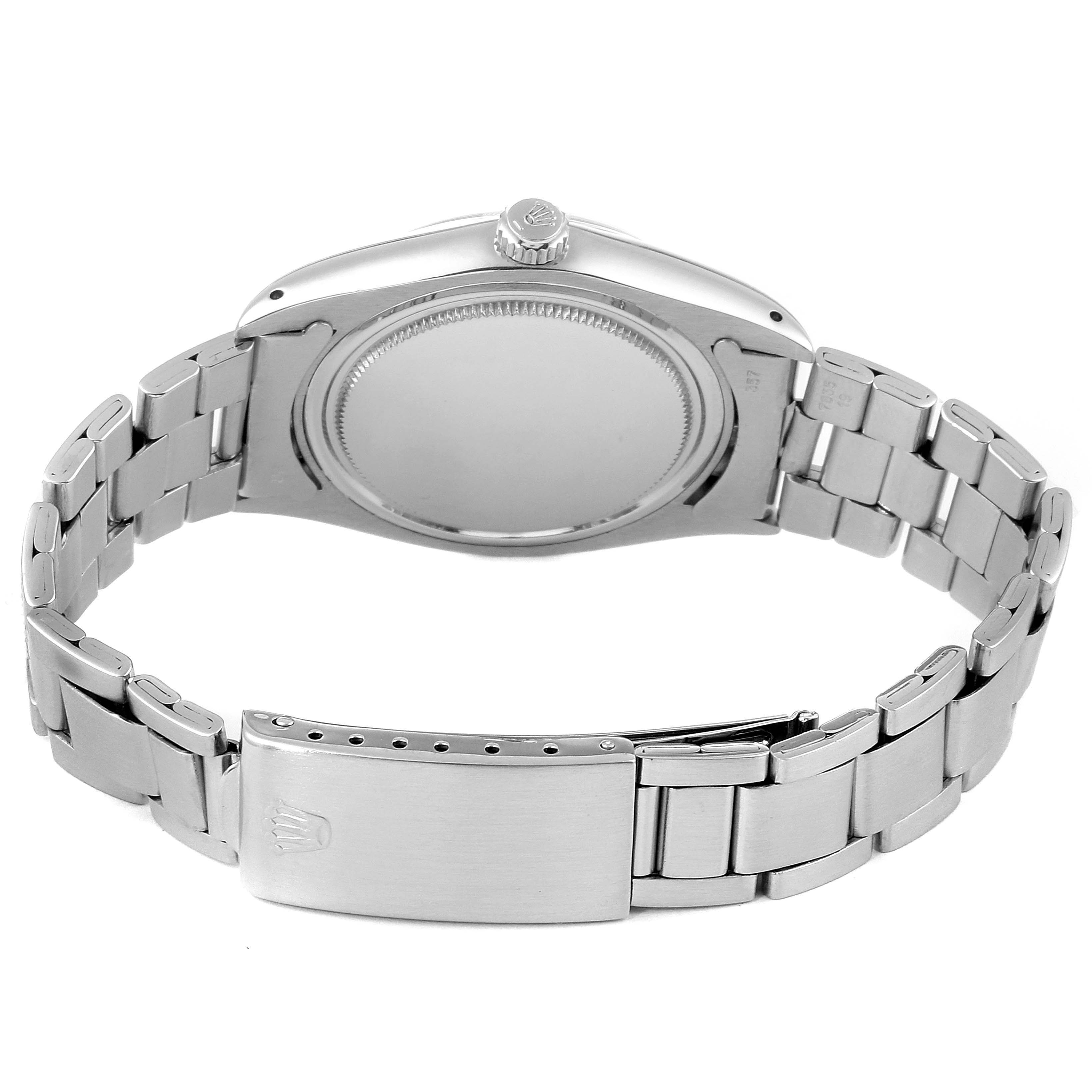 The image shows the back case and bracelet of a Rolex Vintage Collection 6694 Men's Stainless Steel Champagne Dial 6694 Men's Stainless Steel Champagne Dial watch.