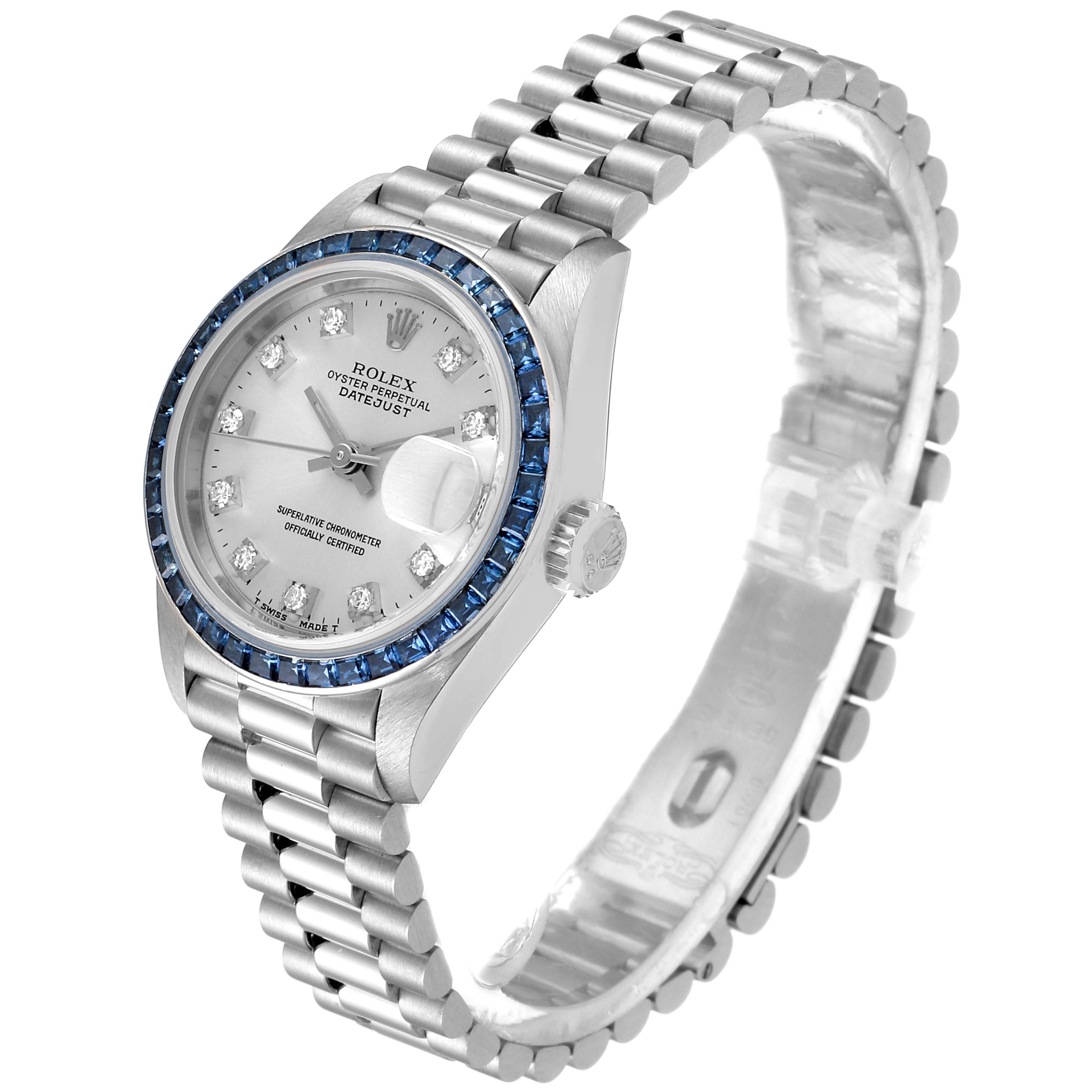 The image shows a Rolex President 69119 Women's White Gold Silver Dial 69119 Women's White Gold Silver Dial model watch at an angle displaying its face, bezel, crown, and bracelet.