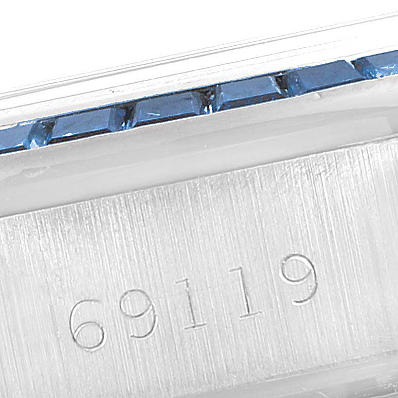 This close-up image shows the model number 69119 on the casing of a Rolex President 69119 Women's White Gold Silver Dial 69119 Women's White Gold Silver Dial watch.