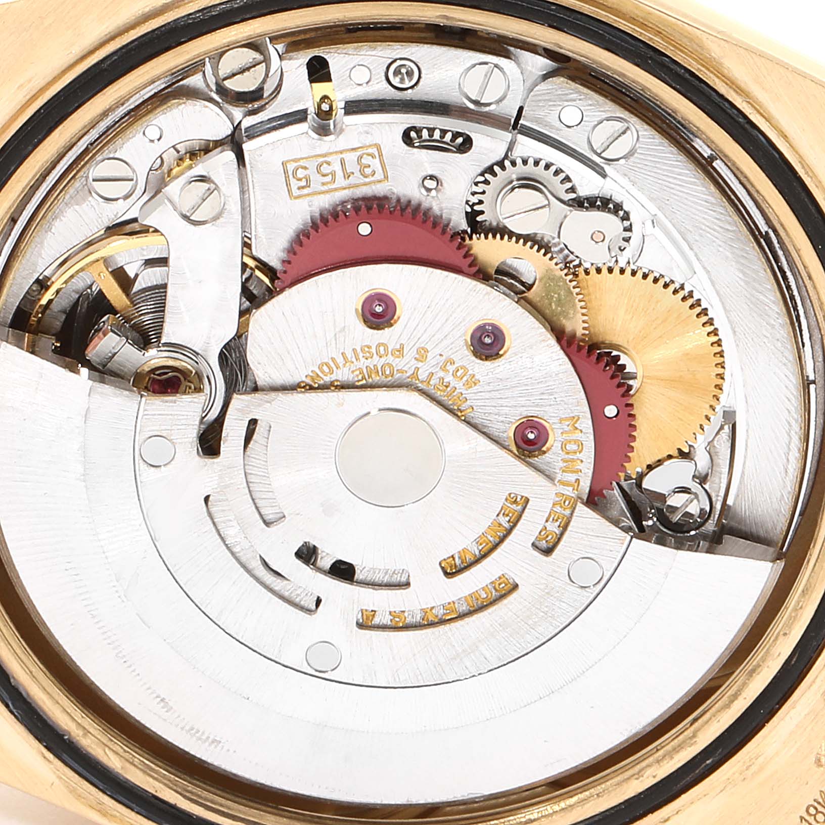 This image shows the internal movement components of a Rolex President 18238 Men
s Yellow Gold Champagne Dial 18238 Men
s Yellow Gold Champagne Dial watch, including gears and other mechanisms.