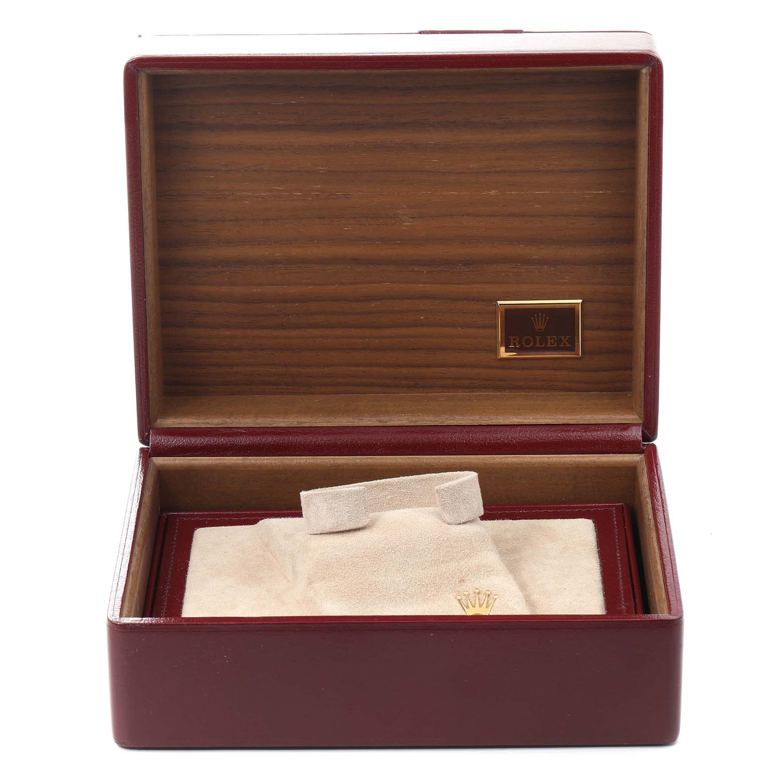 The image shows an open Rolex President 18238 Men
s Yellow Gold Champagne Dial 18238 Men
s Yellow Gold Champagne Dial watch box, featuring a red exterior, wooden interior, and cushion for the watch.