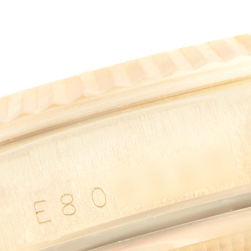 This image shows a close-up angle of the side of the bezel and case of a Rolex President 18238 Men
s Yellow Gold Champagne Dial 18238 Men
s Yellow Gold Champagne Dial model watch.