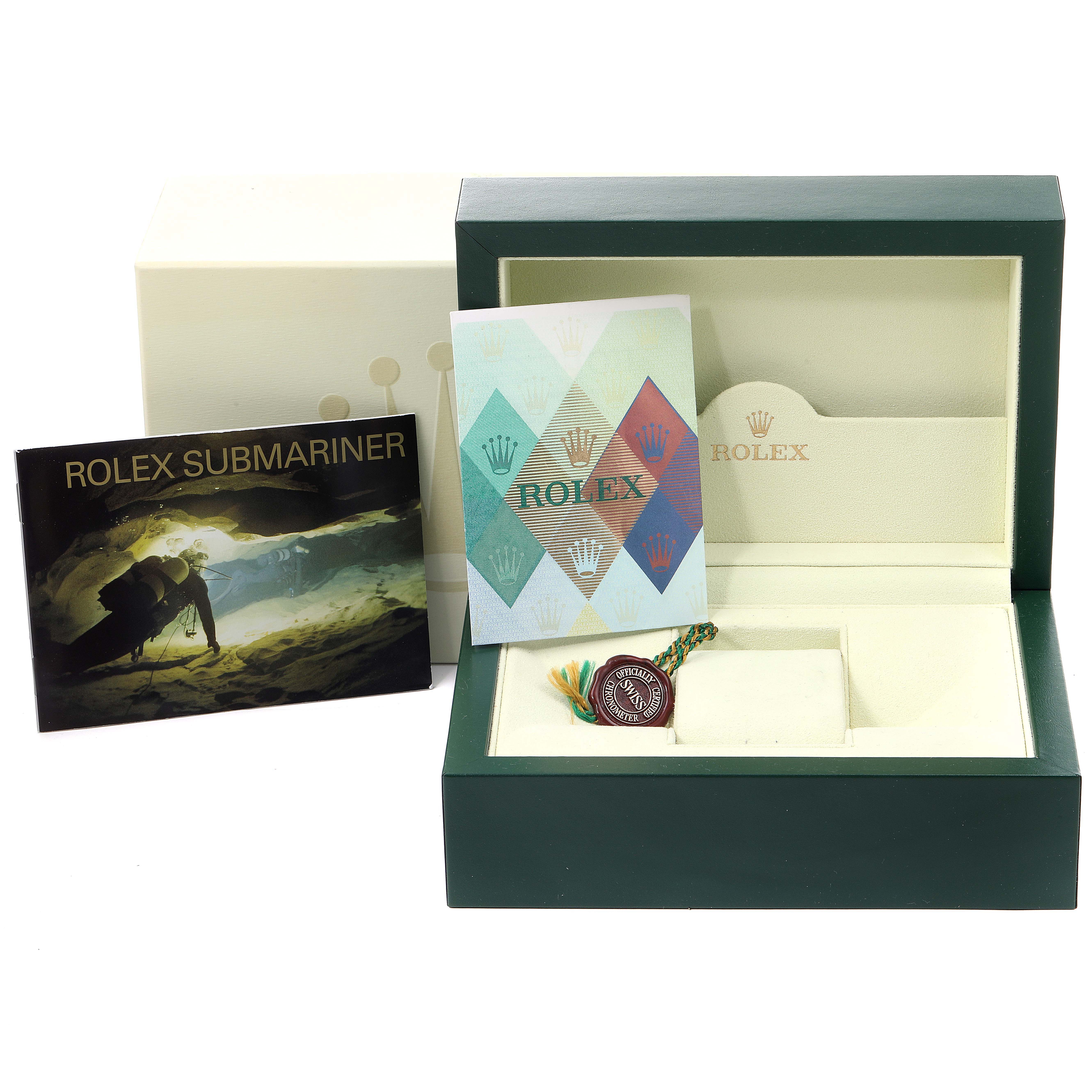 The image shows the packaging, manuals, and tag of a Rolex Submariner 16613 Men's Steel and Gold (two tone) Blue Dial 16613 Men's Steel and Gold (two tone) Blue Dial, without the watch, from a front angle.