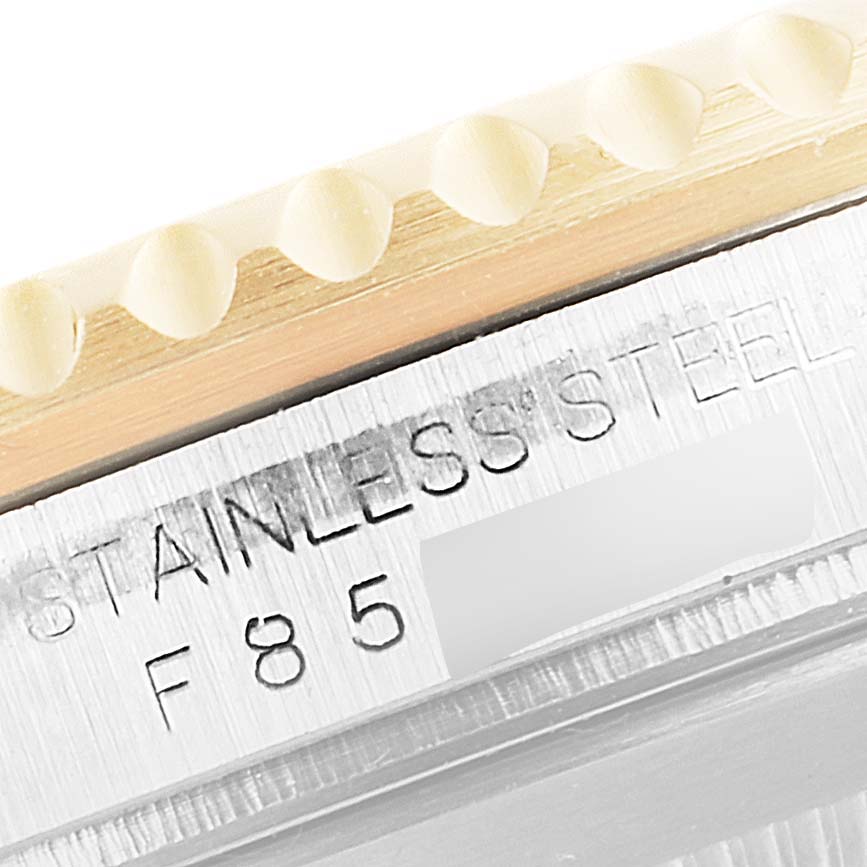 The image shows a close-up of the stainless steel case and bezel of a Rolex Submariner 16613 Men's Steel and Gold (two tone) Blue Dial 16613 Men's Steel and Gold (two tone) Blue Dial watch.