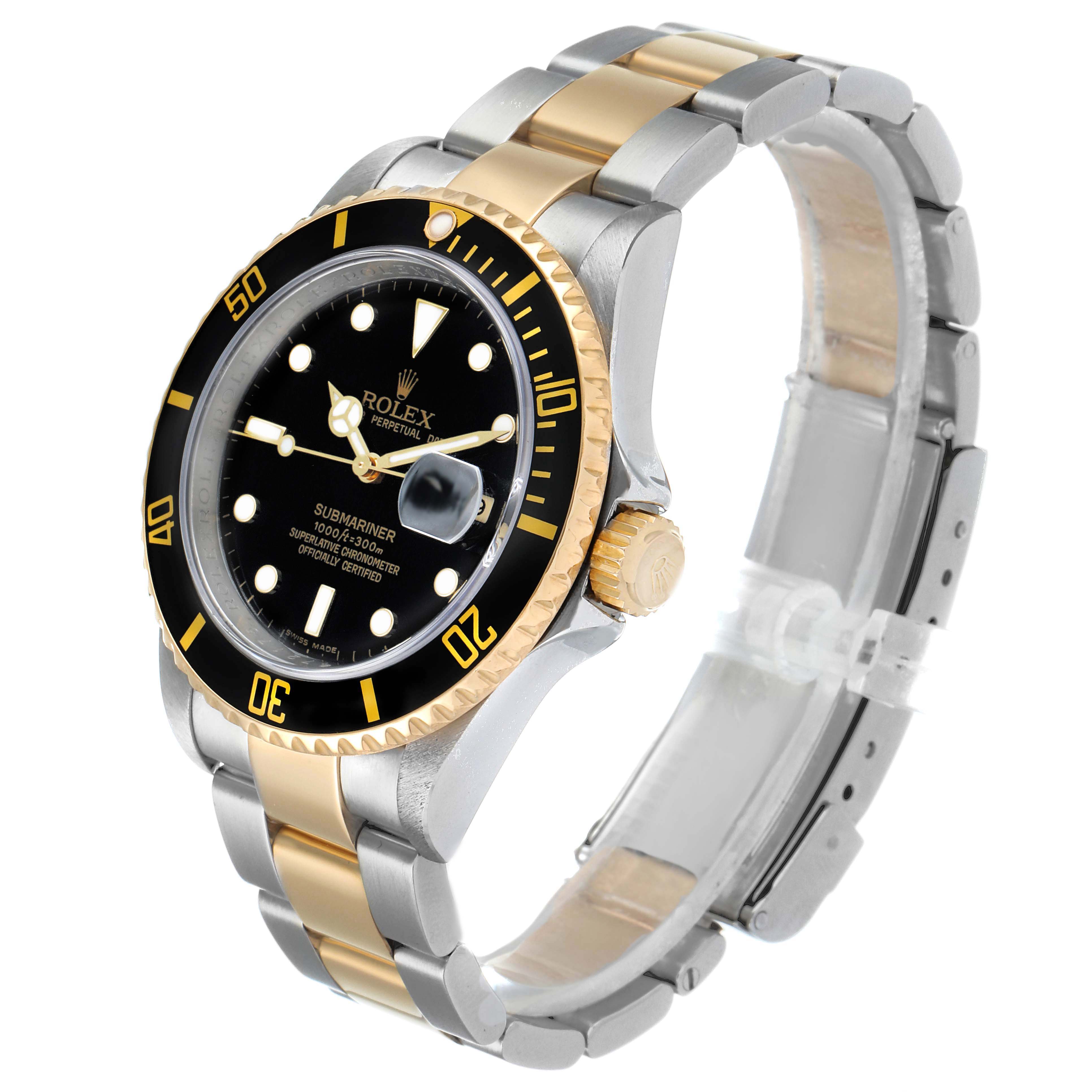 The image shows a Rolex Submariner 16613 Men's Steel and Gold (two tone) Black Dial 16613 Men's Steel and Gold (two tone) Black Dial watch at a slight angle, displaying its face, bezel, crown, and two-tone bracelet.