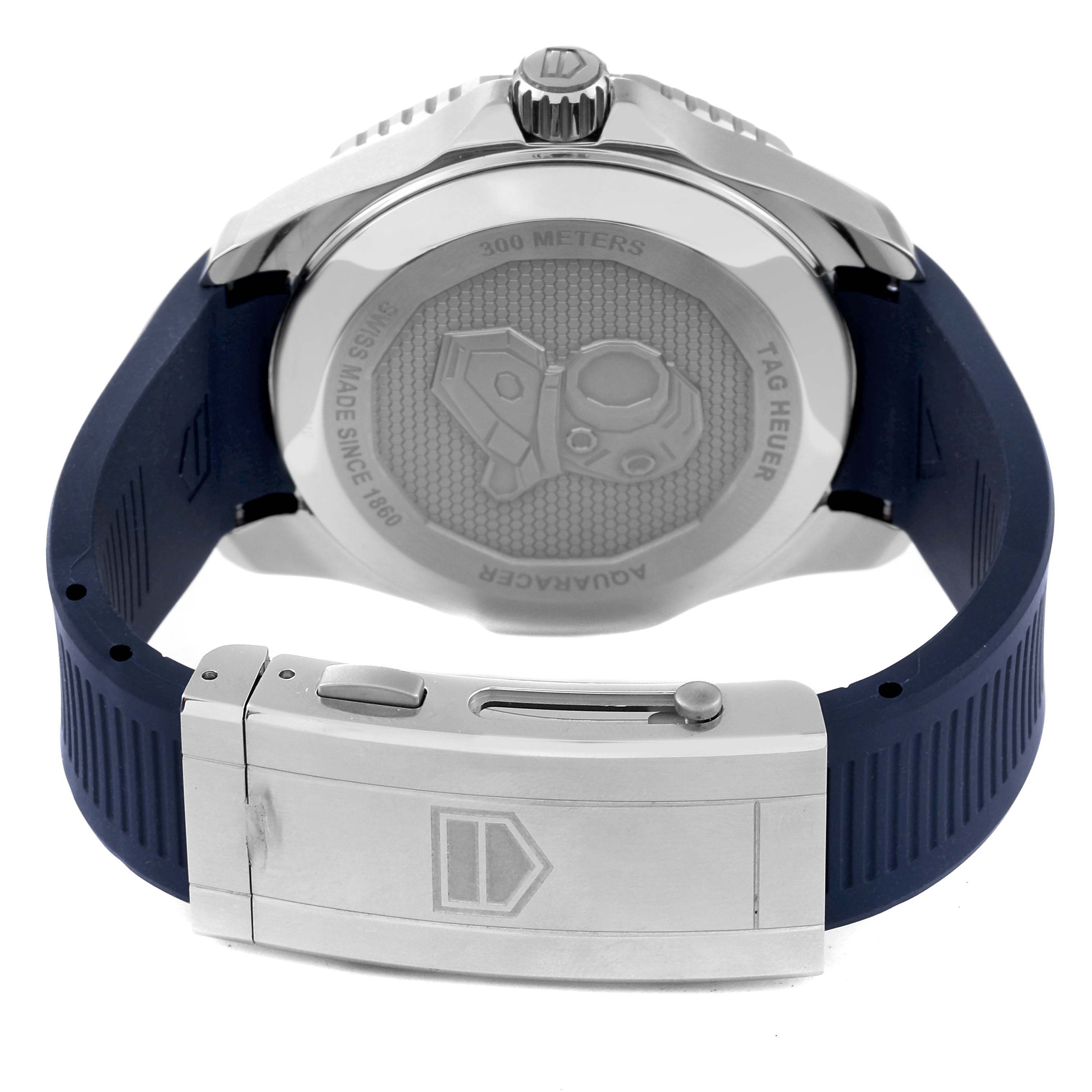 The image shows the back and clasp of a Tag Heuer Aquaracer WBP2010.BA0632 Men's Stainless Steel Blue Dial WBP2010.BA0632 Men's Stainless Steel Blue Dial watch, including the case back engraving and blue strap.
