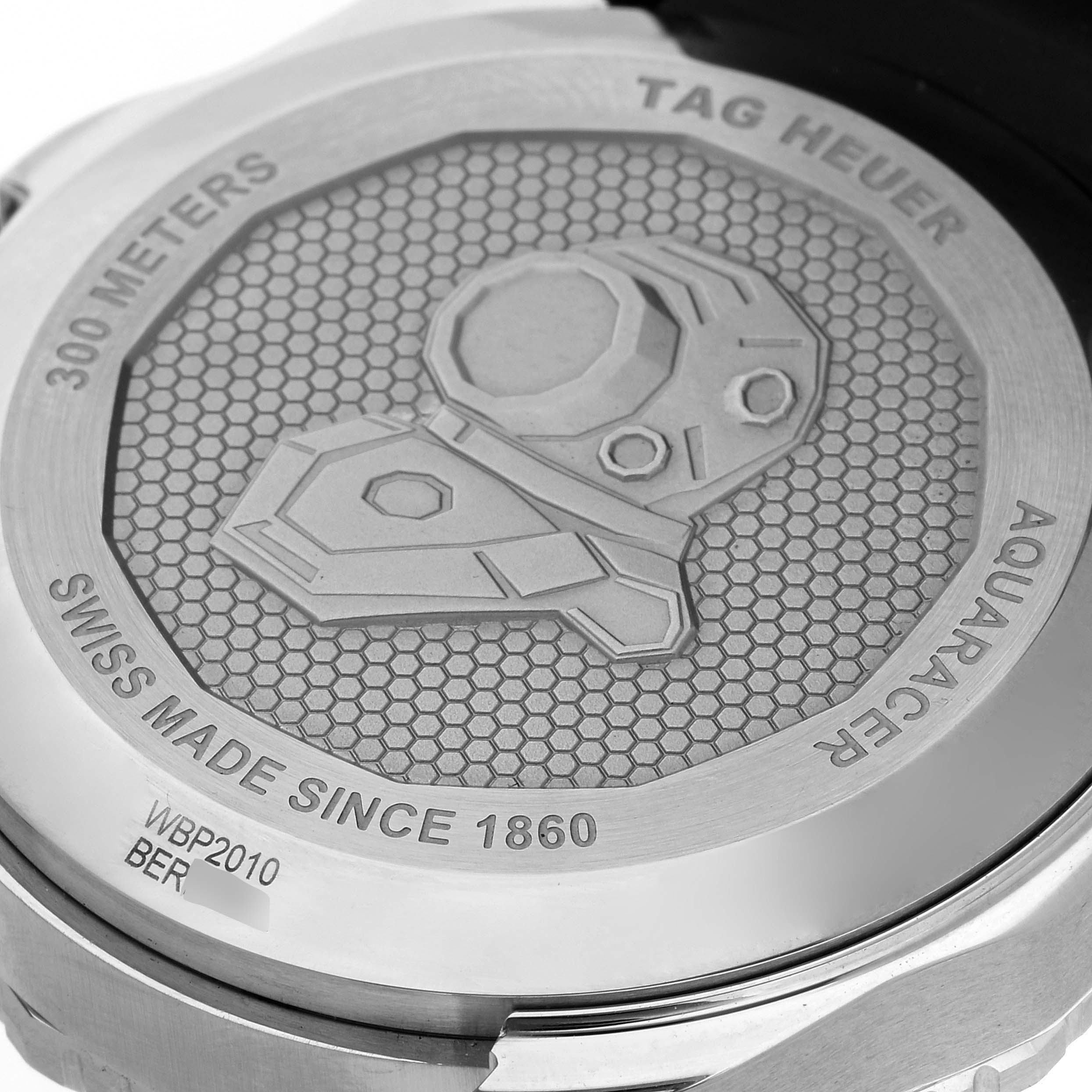 The image shows the case back of the Tag Heuer Aquaracer WBP2010.BA0632 Men's Stainless Steel Blue Dial WBP2010.BA0632 Men's Stainless Steel Blue Dial watch, featuring engraved details and specifications.