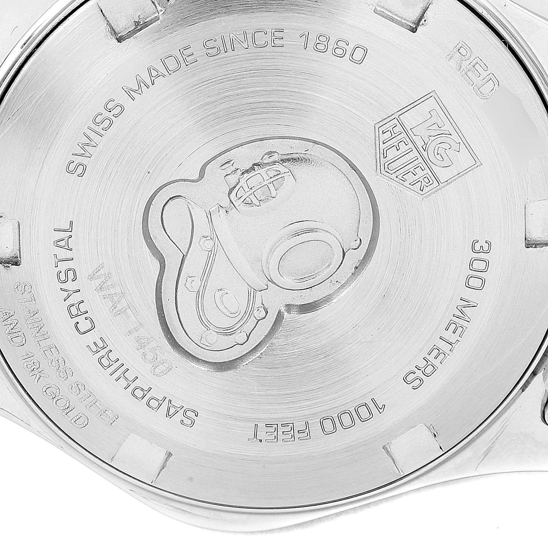 This is a close-up image of the case back of a Tag Heuer Aquaracer WAF1450.BA0825 Women's Steel and Gold (two tone) Mother of Pearl Dial WAF1450.BA0825 Women's Steel and Gold (two tone) Mother of Pearl Dial watch, displaying its engravings and branding.