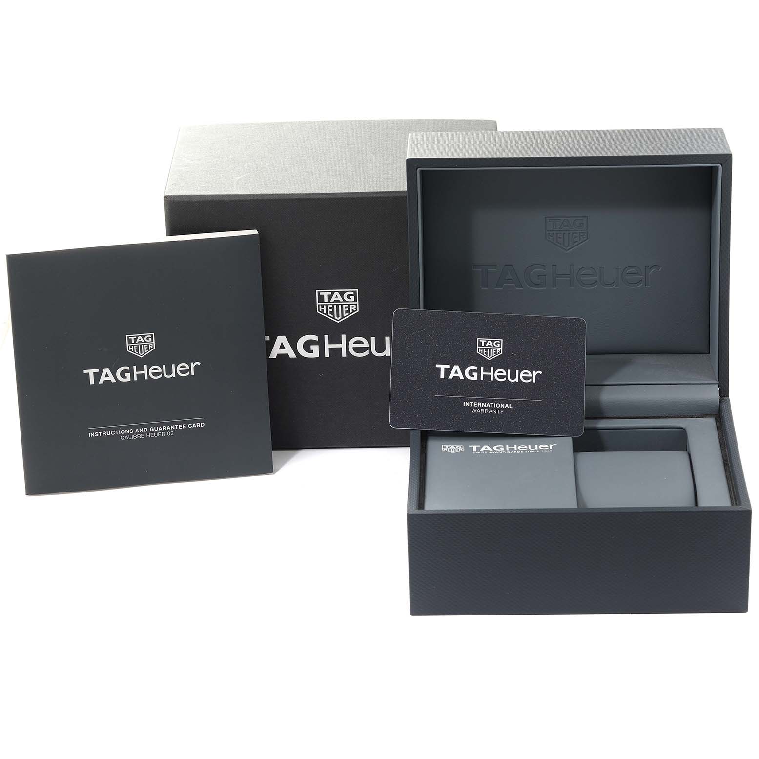 This image shows the packaging, instructions, warranty card, and box for the Tag Heuer Carrera CBG2A90.BH0653 Men's Ceramic Black Dial CBG2A90.BH0653 Men's Ceramic Black Dial watch model.