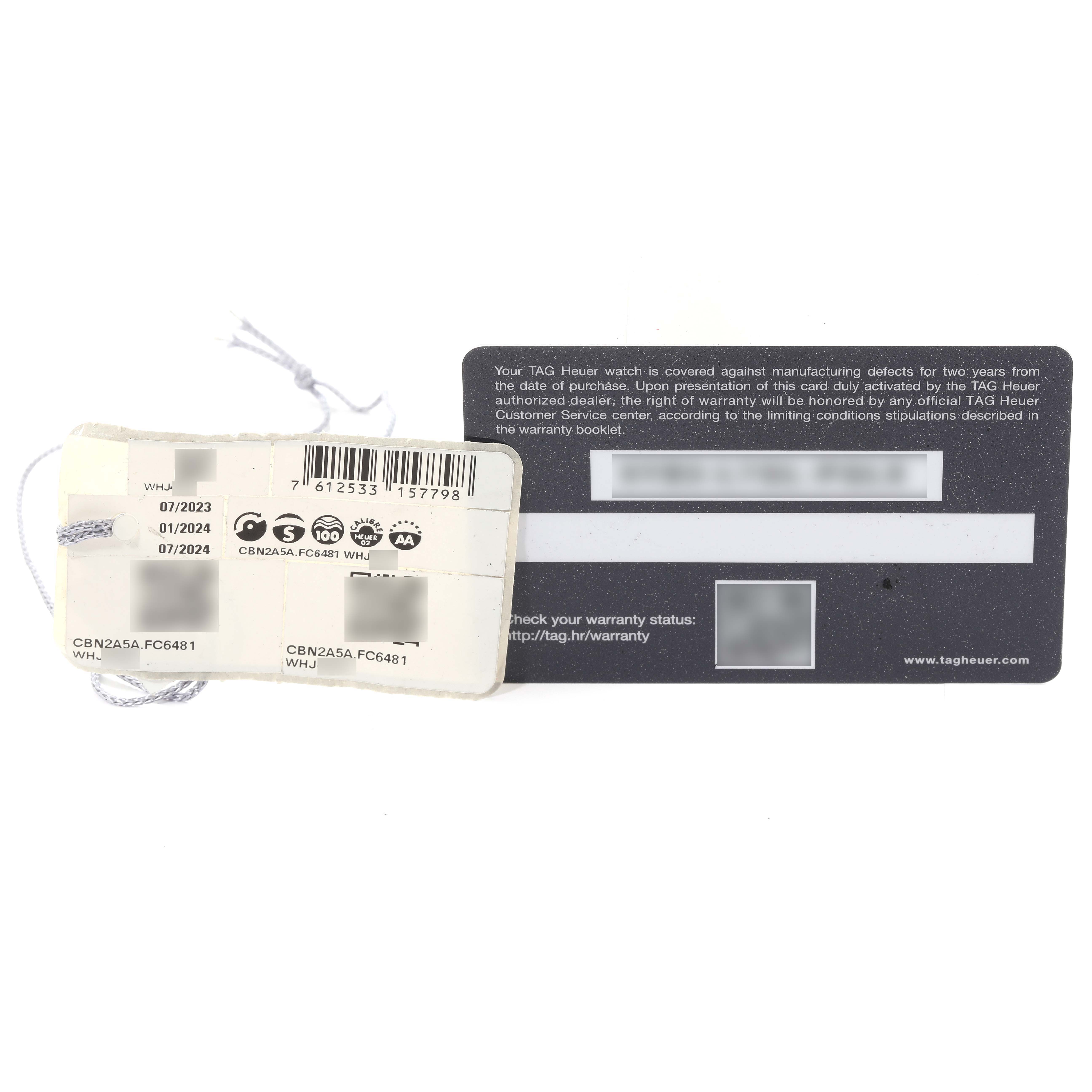 The image shows a warranty card and two attached tags for the Tag Heuer Carrera CBN2A5A.FC6481 Men's Steel and Gold (two tone) Black Dial CBN2A5A.FC6481 Men's Steel and Gold (two tone) Black Dial model watch, viewed from the front.