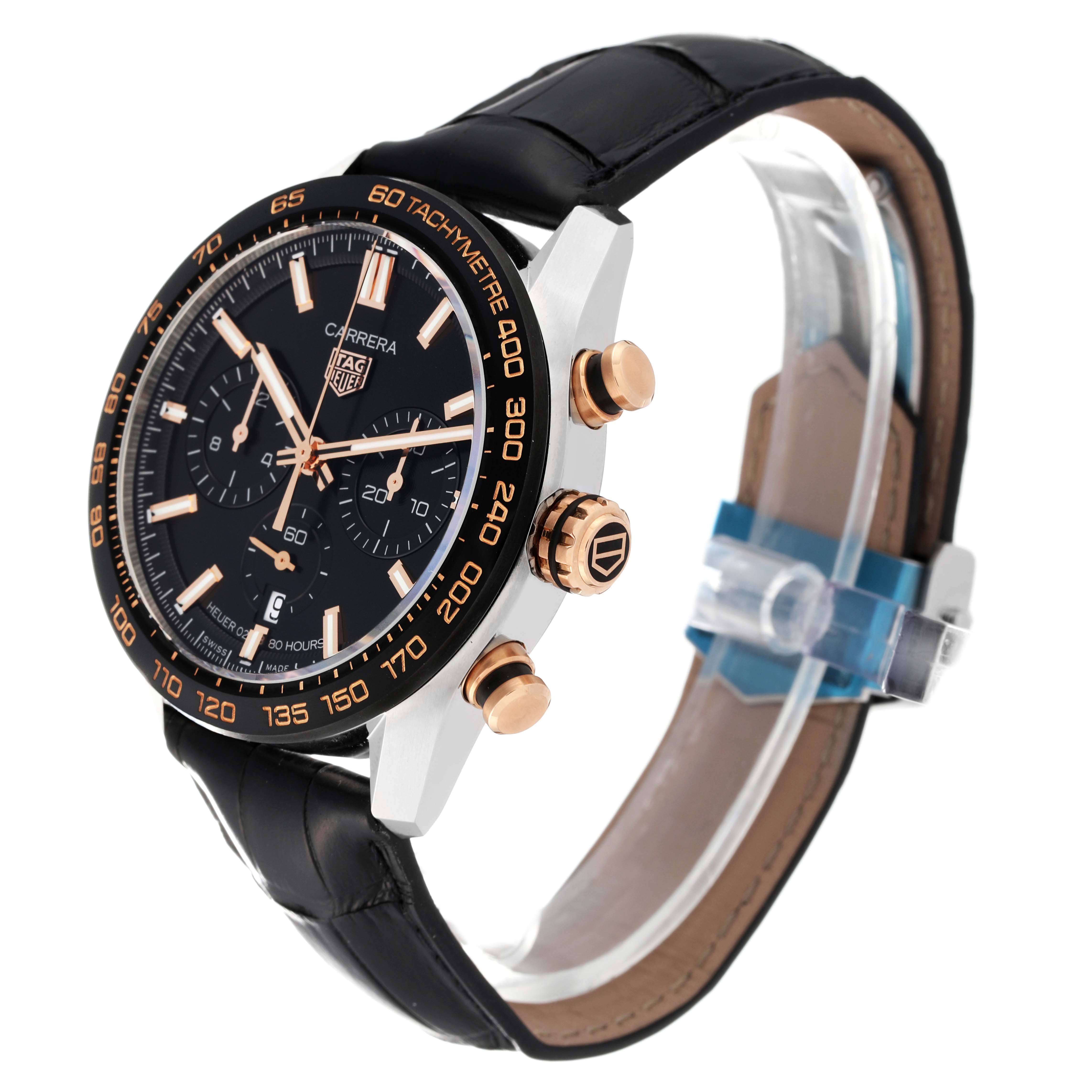 This image shows a Carrera model by Tag Heuer at a three-quarter angle, highlighting the dial, crown, pushers, and leather strap.