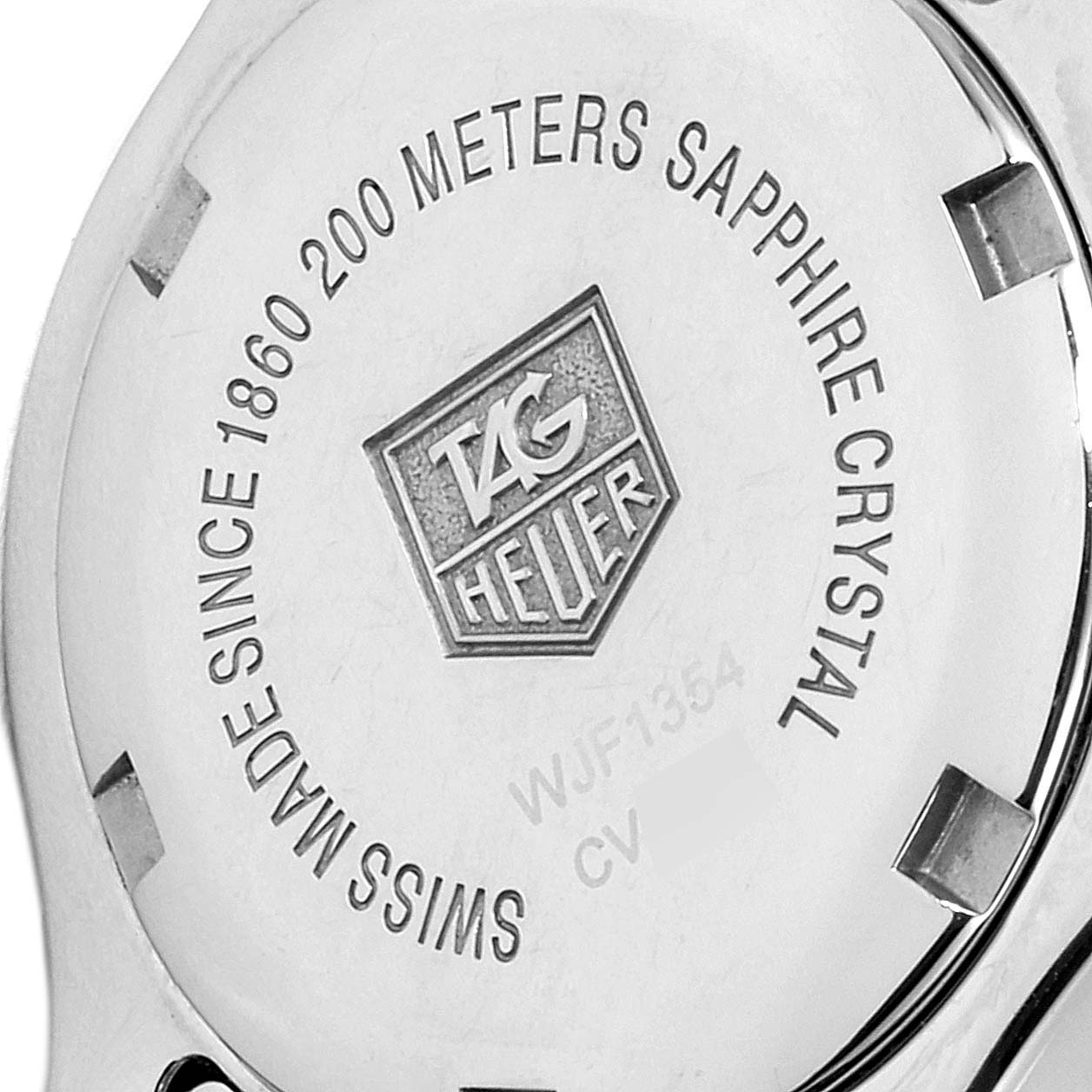 This image shows the back case of a Tag Heuer Link WJF1354.BB0581 Women
s Steel and Gold (two tone) Mother of Pearl Dial WJF1354.BB0581 Women
s Steel and Gold (two tone) Mother of Pearl Dial model watch with brand markings and specifications.