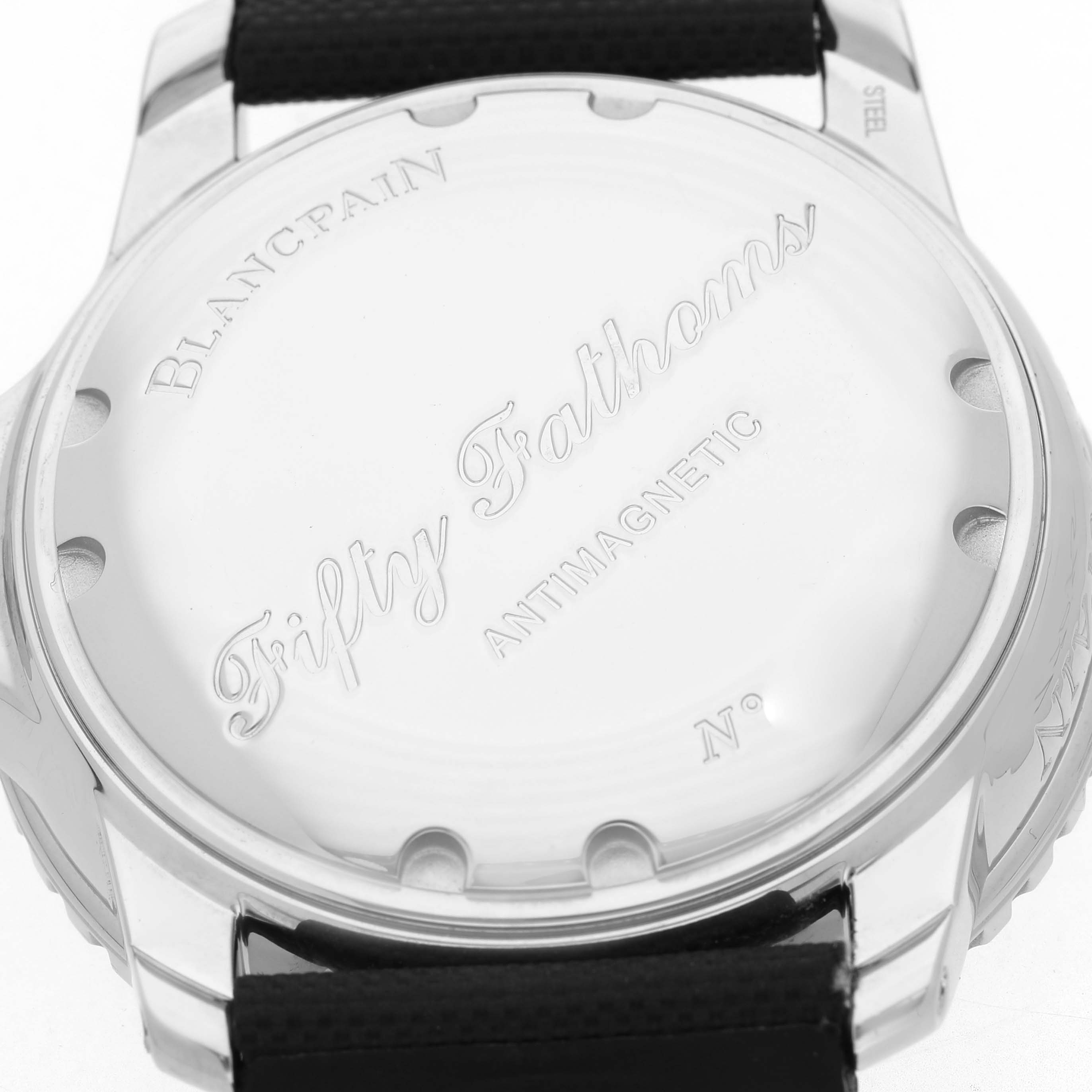 The image shows the back of the Blancpain Fifty Fathoms 5015-1130-52A Men's Stainless Steel Black Dial watch, featuring the brand and model name.