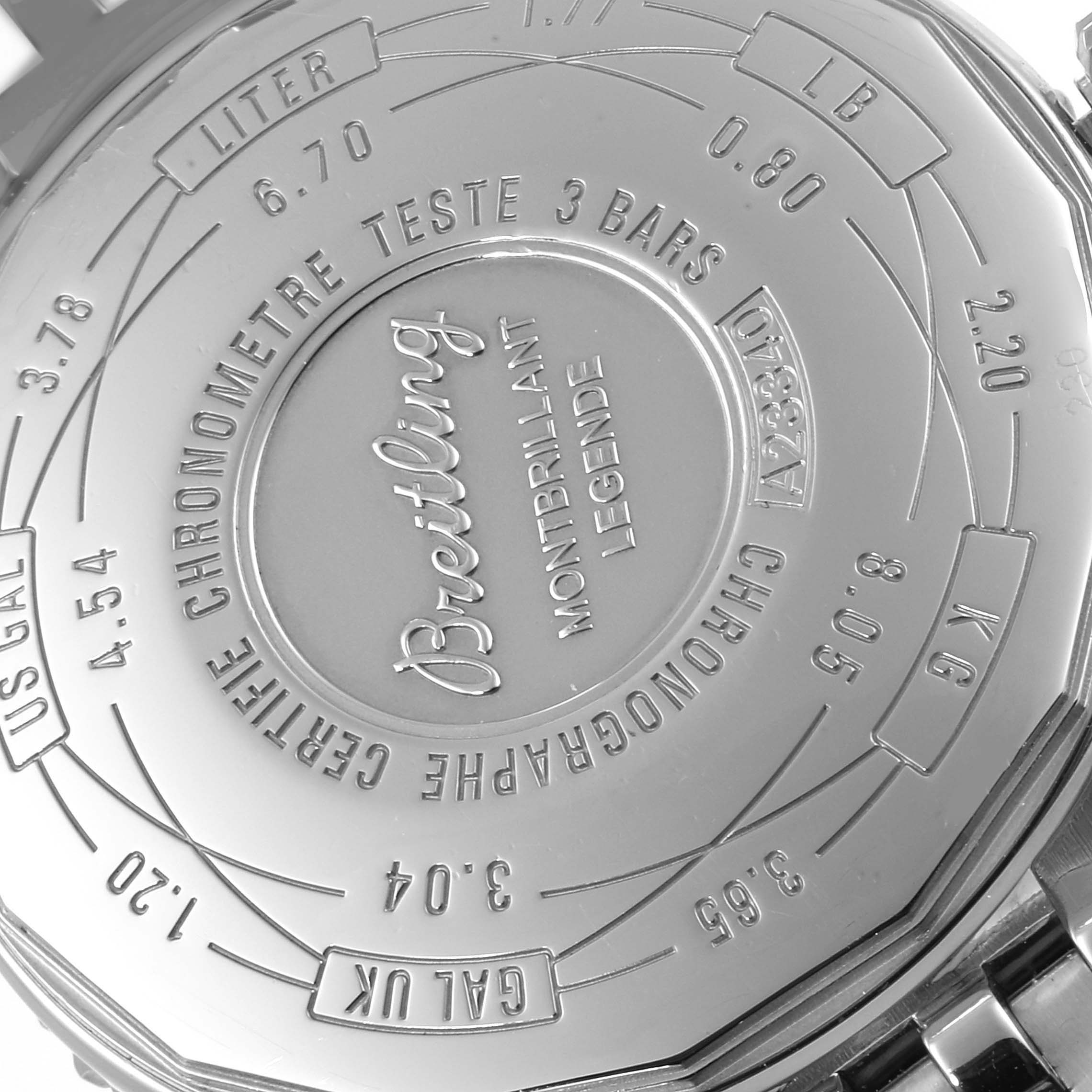 The image shows the back case of a Breitling Navitimer A23340 Men's Stainless Steel Black Dial A23340 Men's Stainless Steel Black Dial watch, featuring engravings and conversion scales.