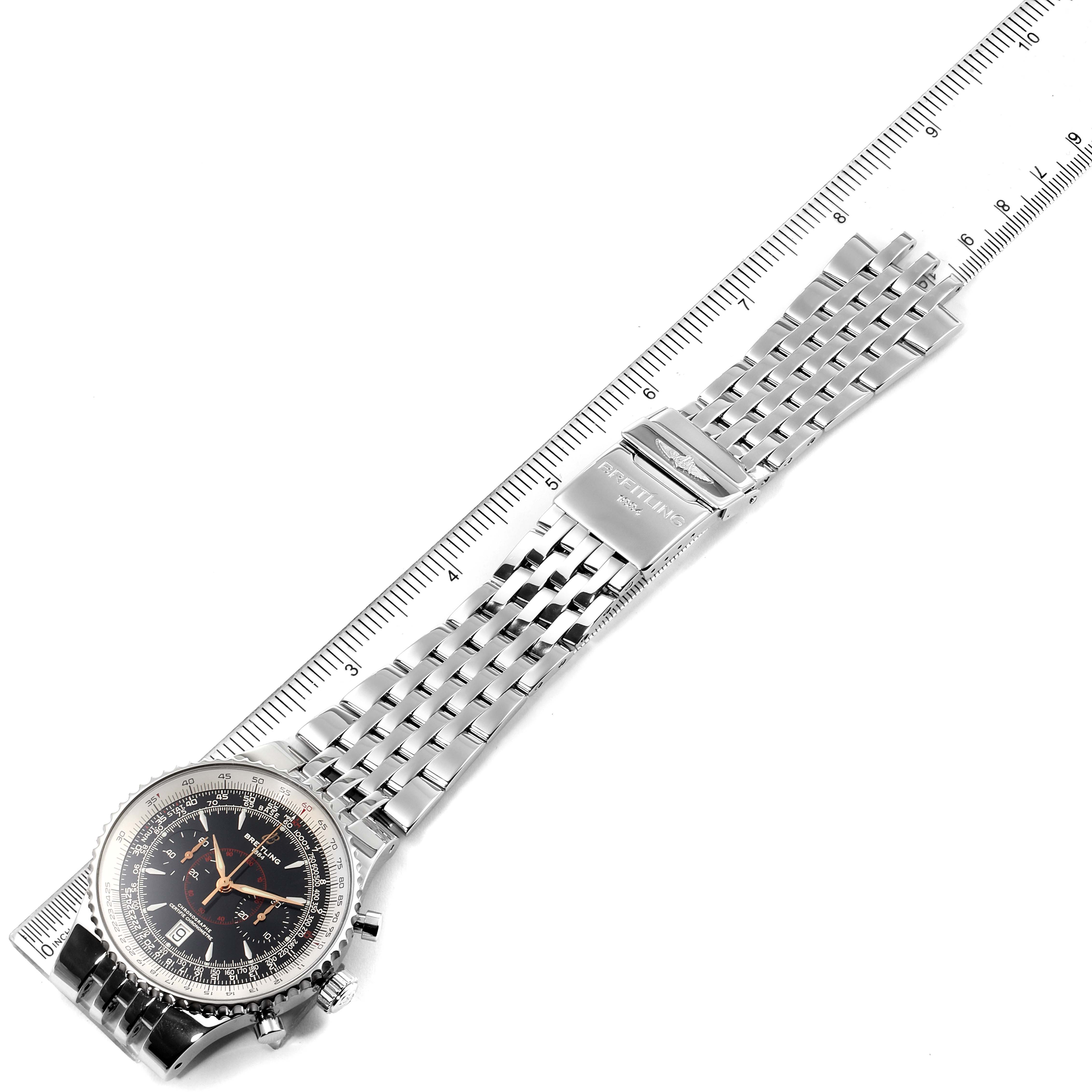 This image shows a Breitling Navitimer A23340 Men's Stainless Steel Black Dial A23340 Men's Stainless Steel Black Dial watch from an angled top-down perspective, highlighting the watch face, bezel, and metal bracelet.