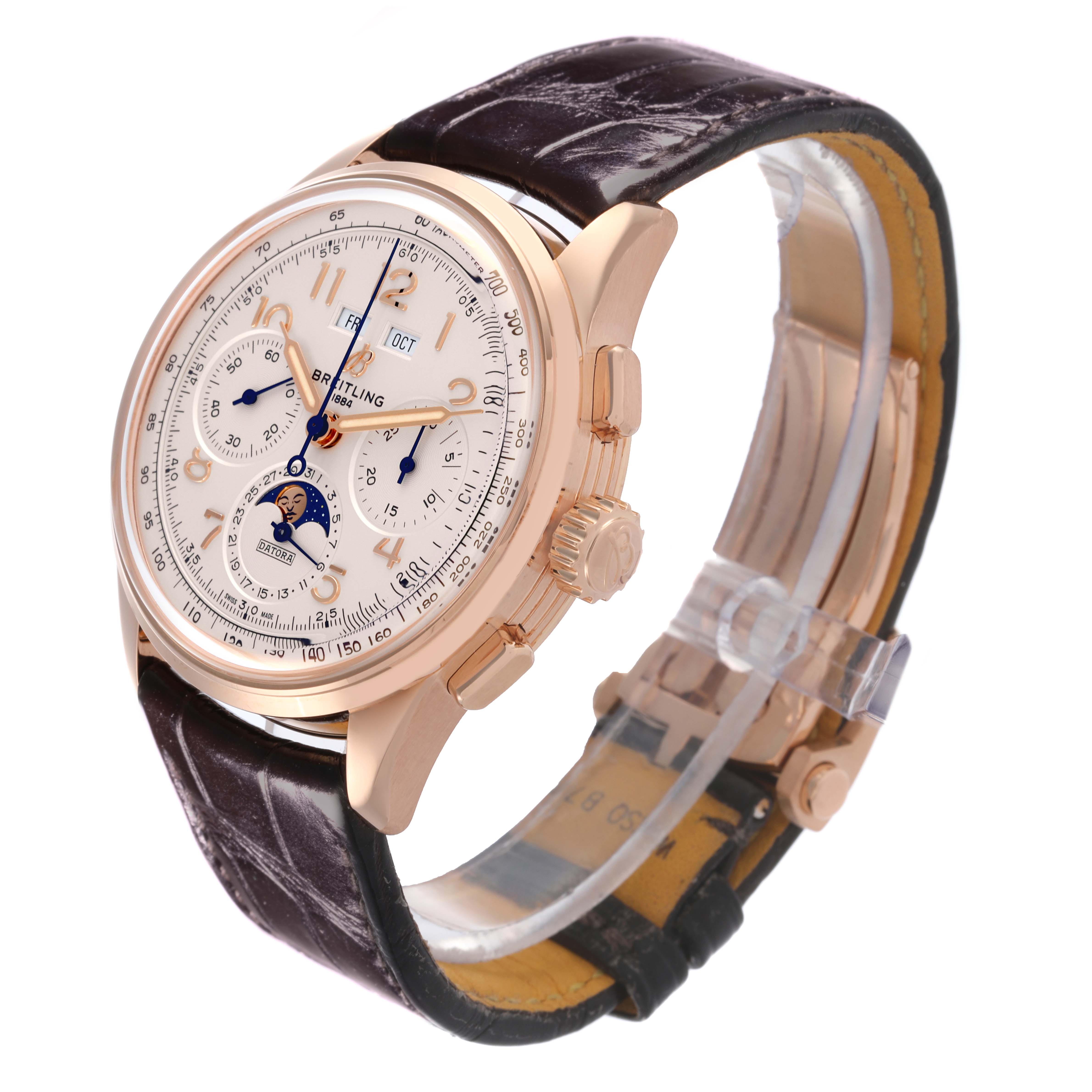 The Breitling Premier RB2510 Men's Rose Gold Silver Dial model is shown at a three-quarter angle, highlighting its dial, case, crown, and leather strap.