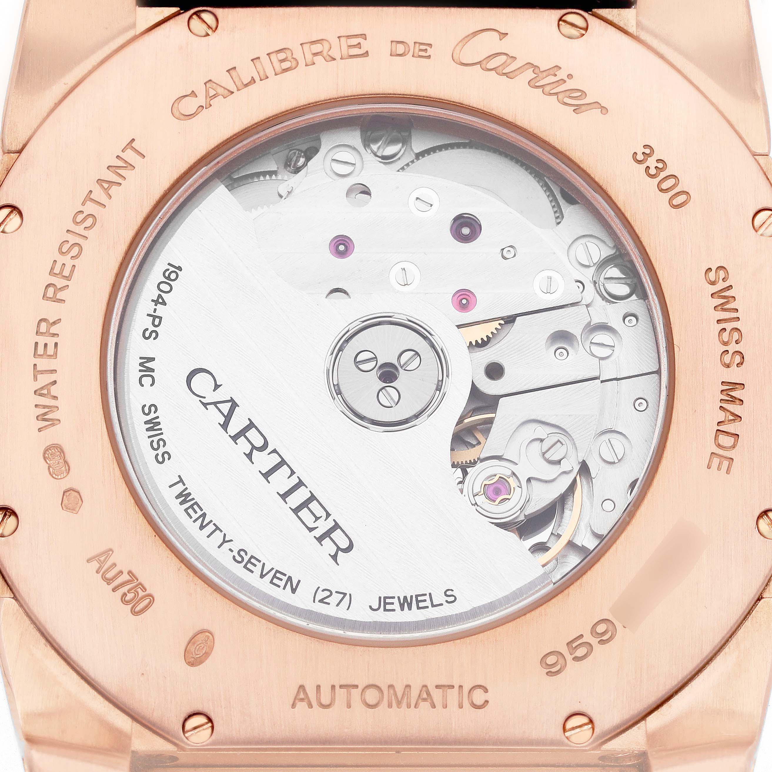 The image shows the back of a Calibre de Cartier watch, model number W7100007, featuring its automatic movement and marked details.