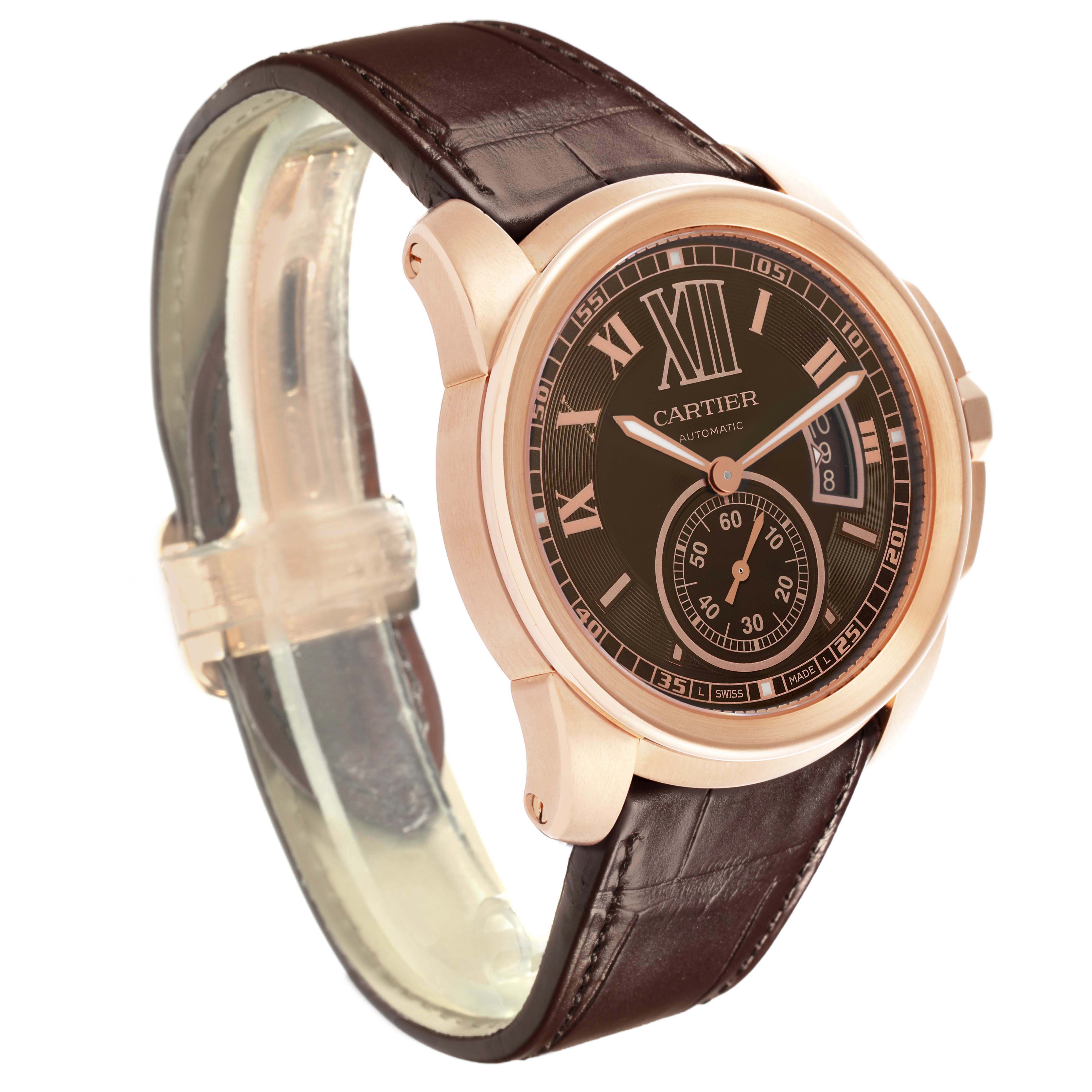 The Calibre de Cartier model W7100007 men's watch is shown at an angled side view, displaying the dial, leather strap, and part of the case design.