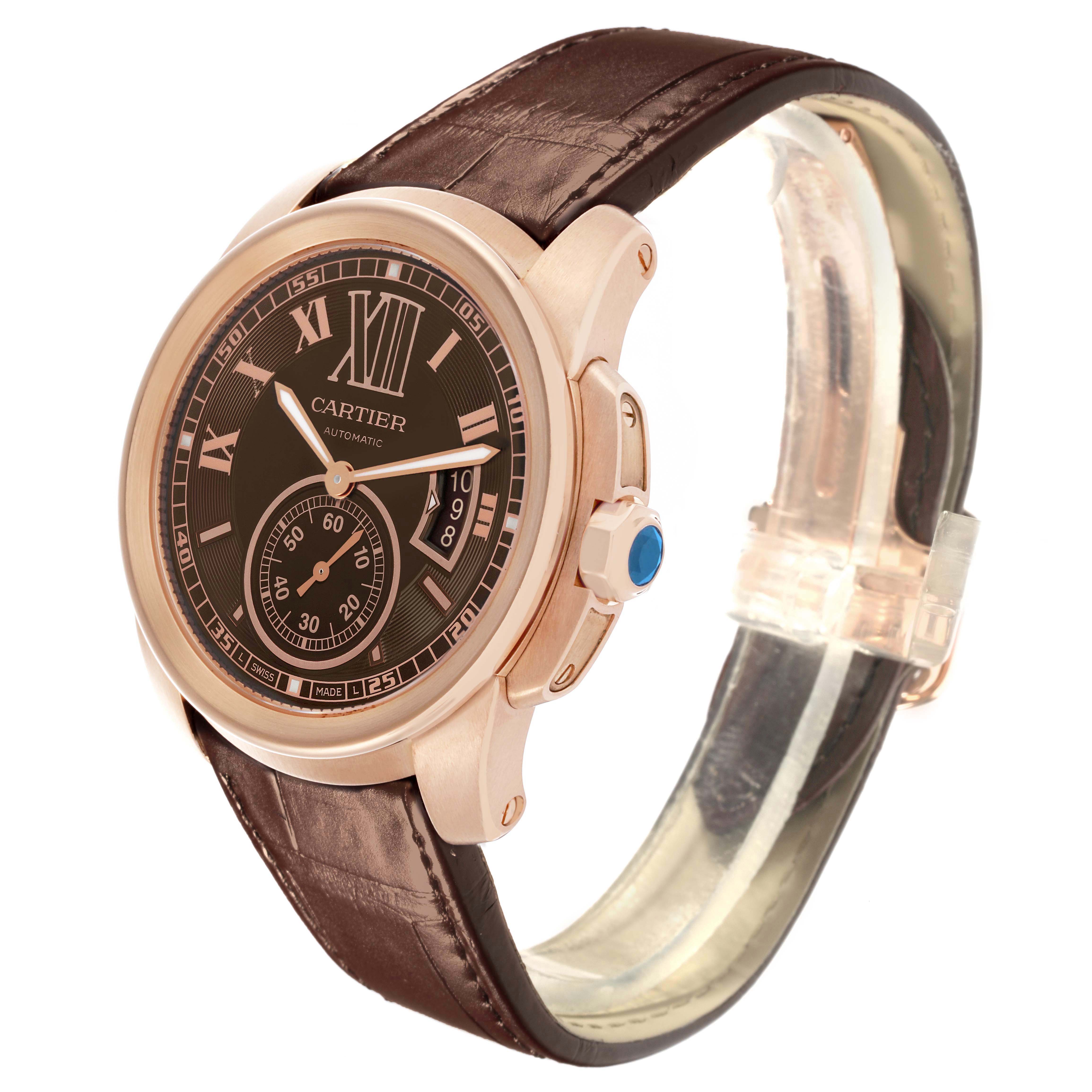 The Calibre de Cartier watch, model number W7100007, is shown at a side angle displaying its dial, bezel, crown, and brown leather strap.
