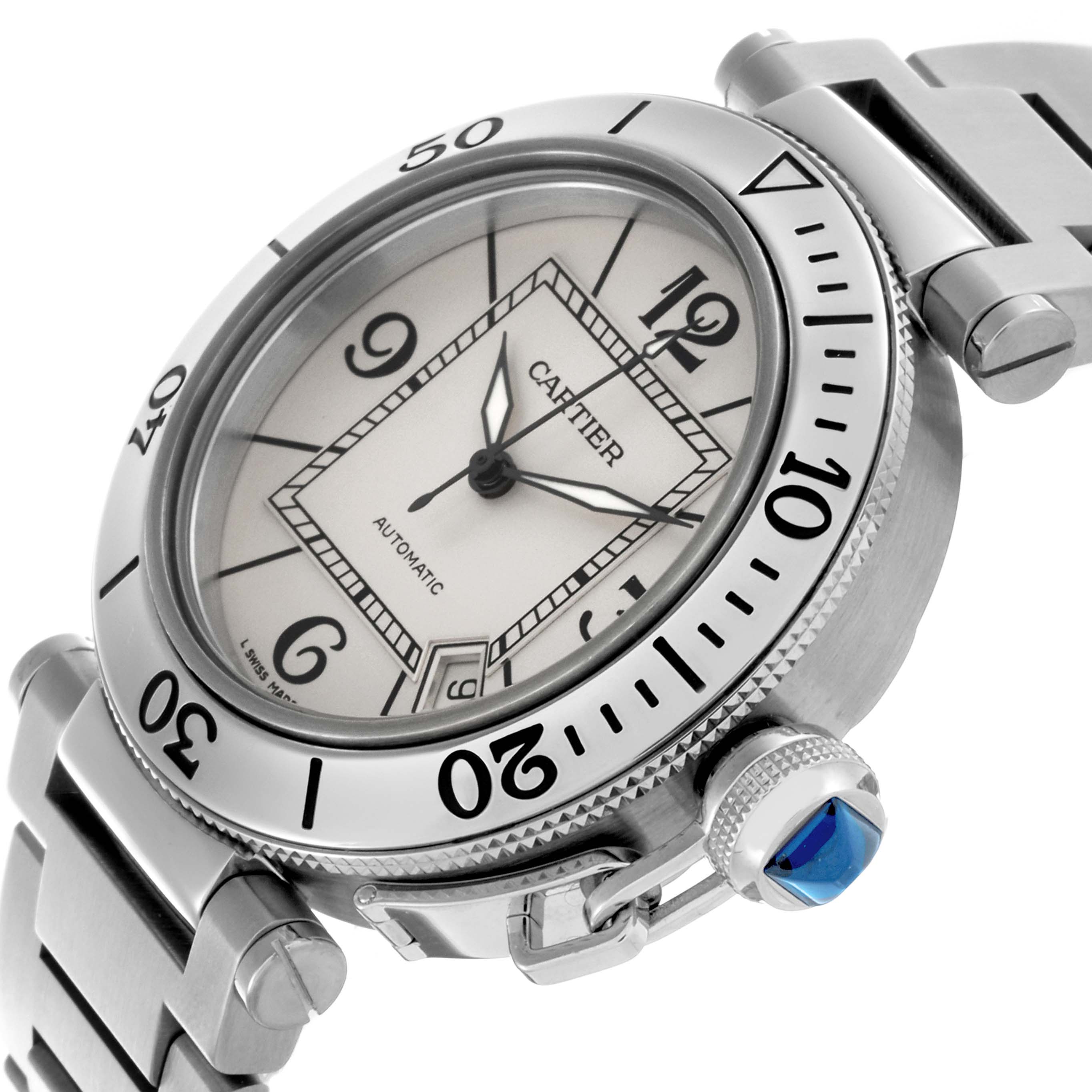 The Cartier Pasha W31080M7 Men's Stainless Steel Silver Dial W31080M7 Men's Stainless Steel Silver Dial watch is shown at an angled view, highlighting the dial, bezel, bracelet, and crown with a blue gem.