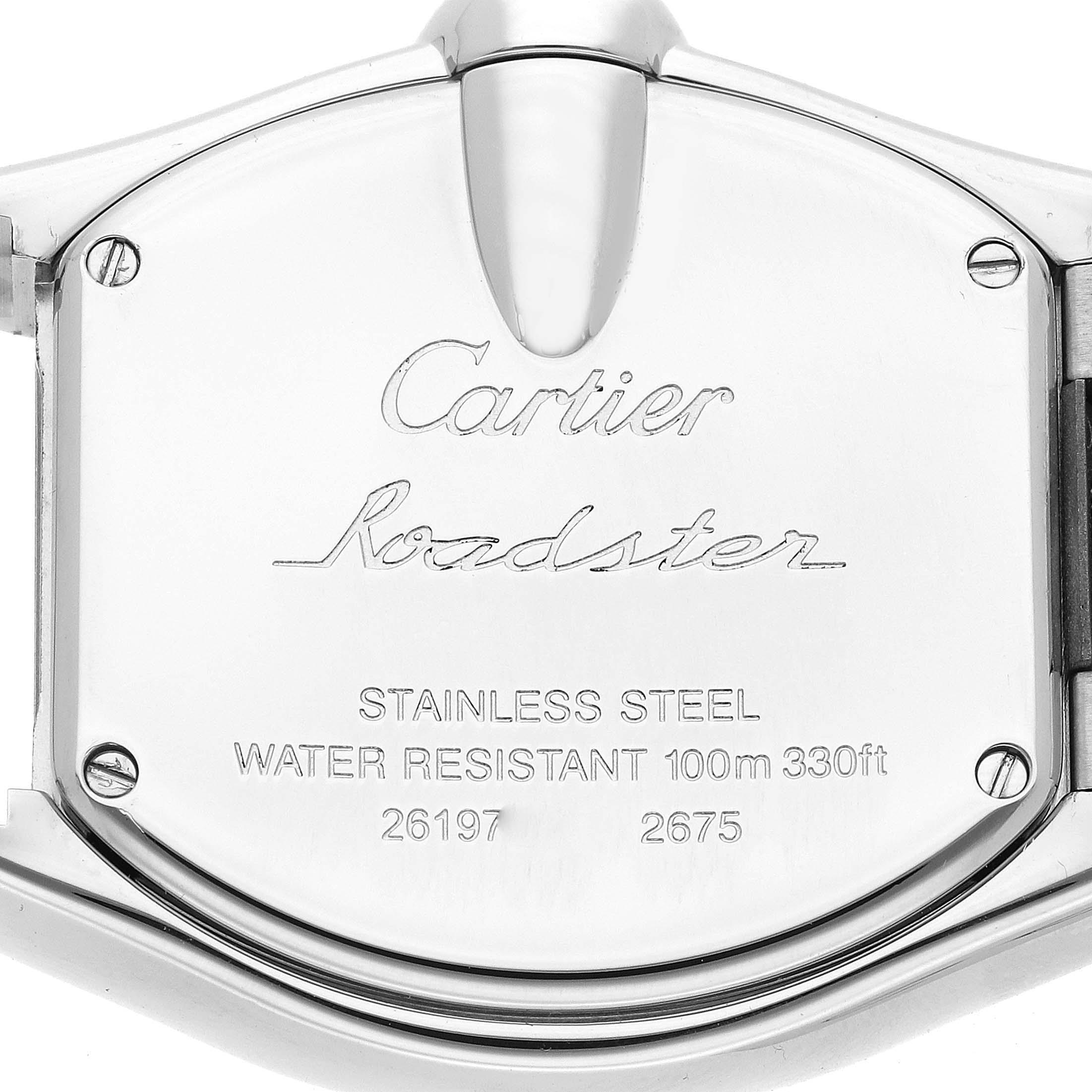 The image shows the back case of a Cartier Roadster W62017V3 Women's Stainless Steel Pink Dial W62017V3 Women's Stainless Steel Pink Dial watch, highlighting engraving details and screws.