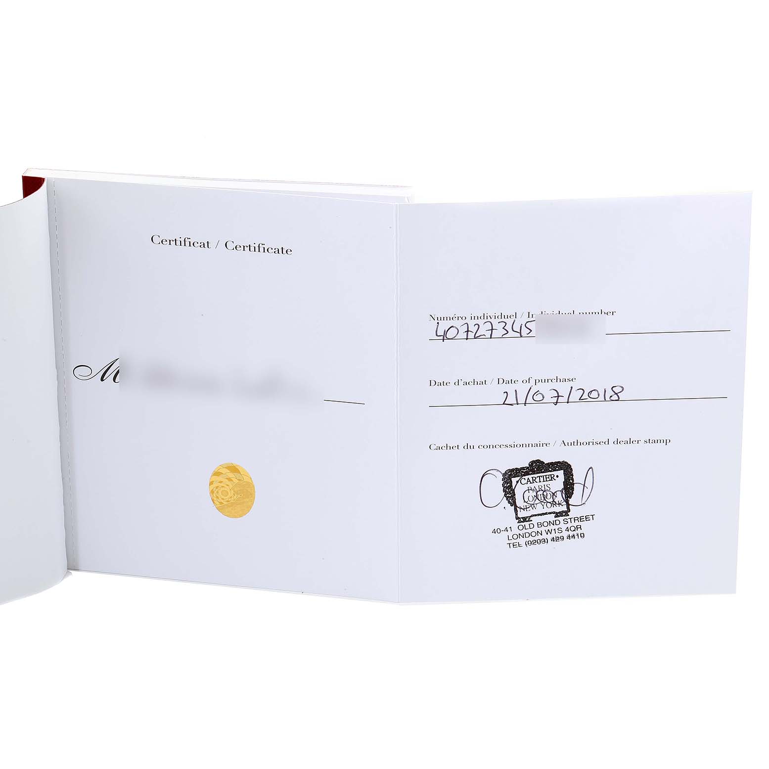 The image shows an open certificate booklet for the Santos watch model by Cartier, including purchase date and dealer stamp.