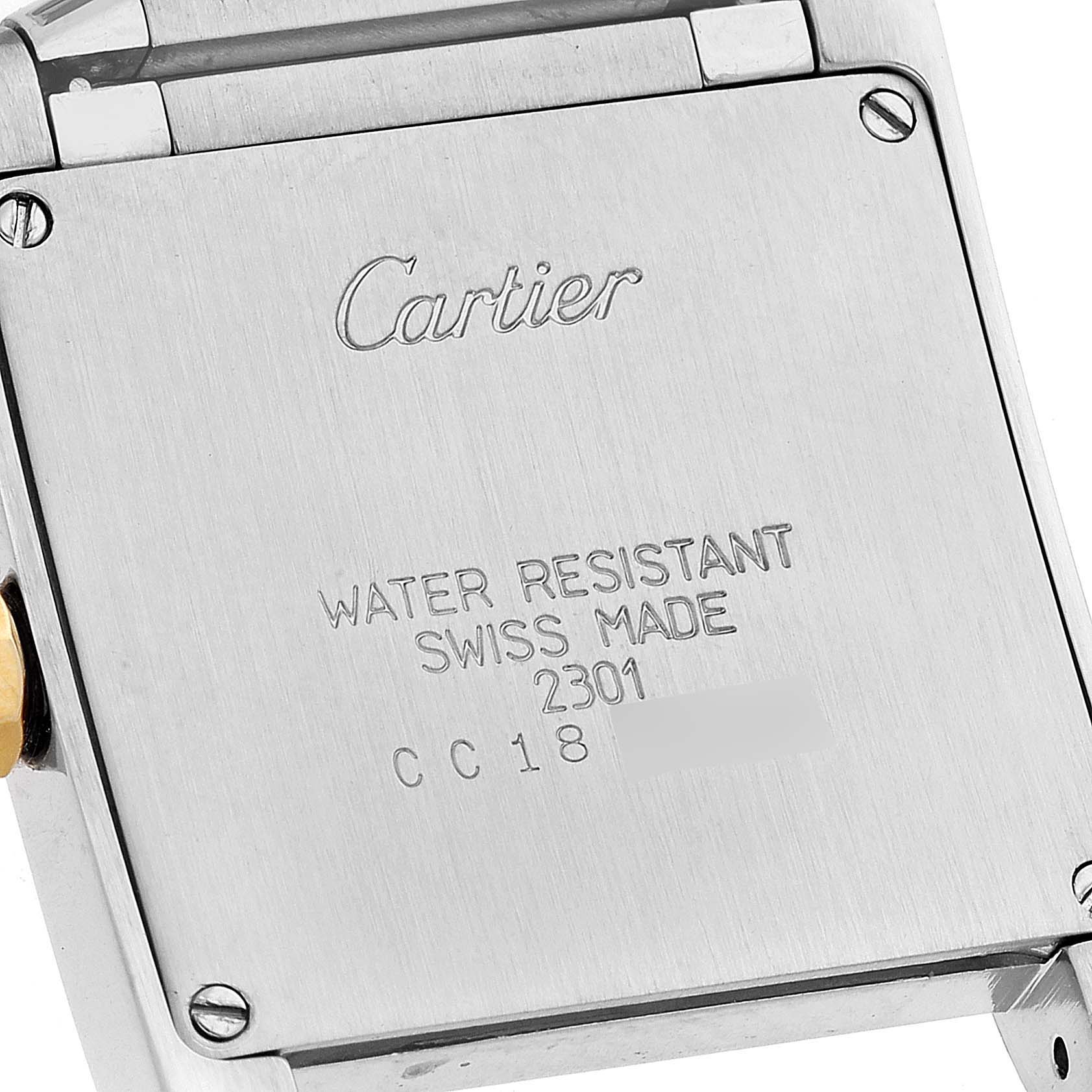 The image shows the back case of a Cartier Tank Francaise W2TA0003 Women's Steel and Gold (two tone) Silver Dial W2TA0003 Women's Steel and Gold (two tone) Silver Dial watch, detailing its water resistance and Swiss origin.