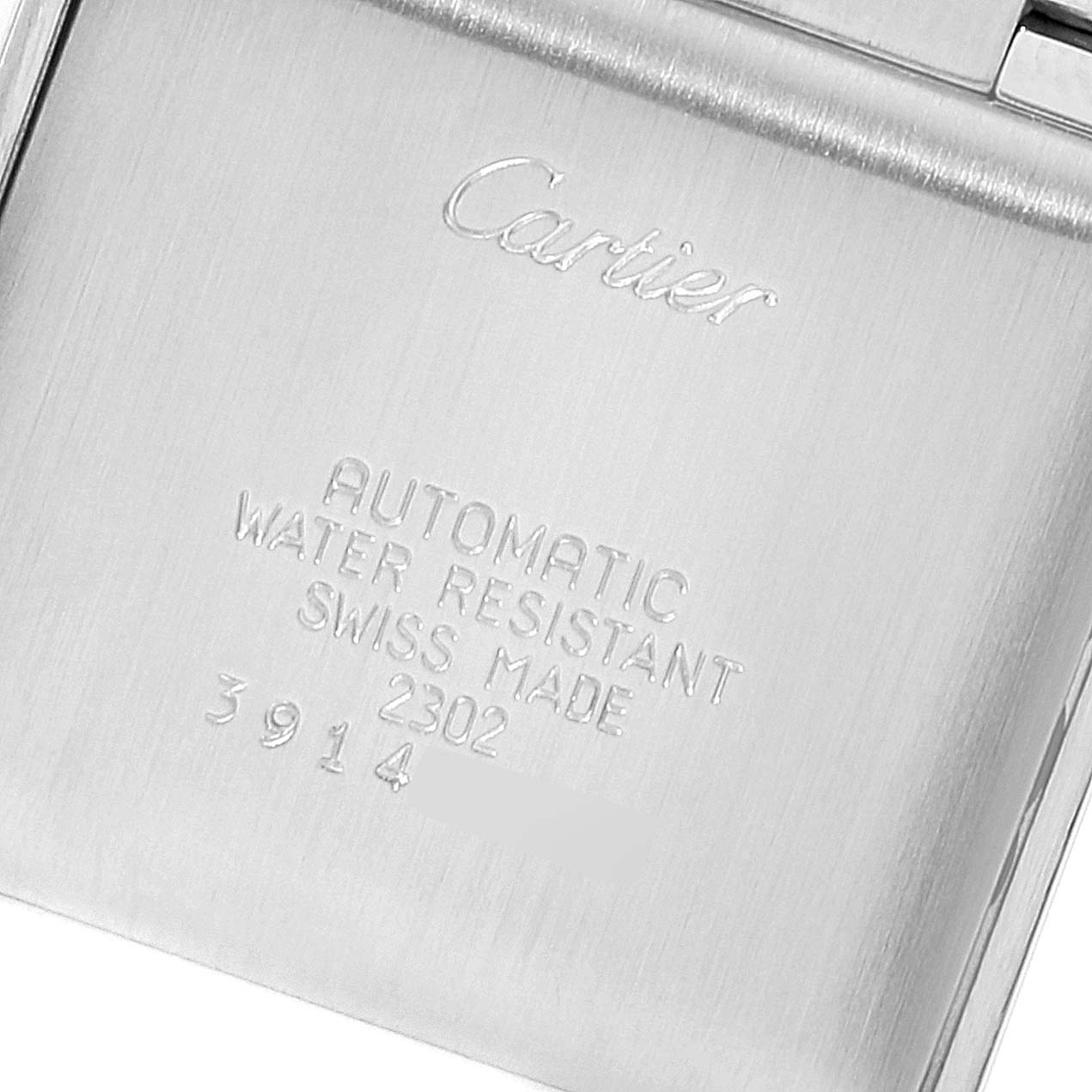 This image shows the back of a Cartier Tank Francaise W51005Q4 Men's Steel and Gold (two tone) Silver Dial W51005Q4 Men's Steel and Gold (two tone) Silver Dial watch, featuring the branding and specifications.