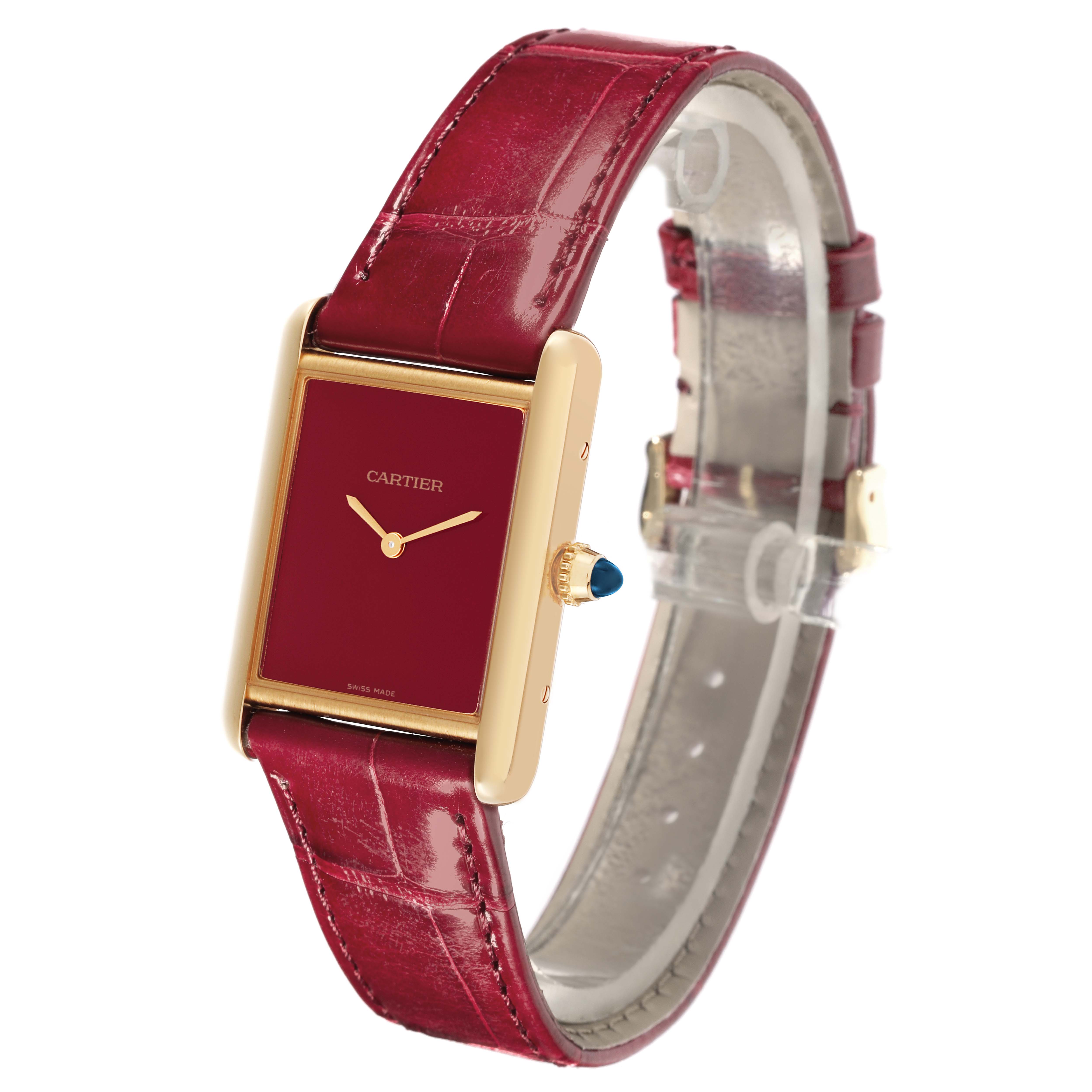 The Cartier Tank Louis WGTA0190 Men's Yellow Gold Red Dial WGTA0190 Men's Yellow Gold Red Dial watch is shown from a three-quarter angle, displaying the red dial, gold case, crown, and red leather strap.