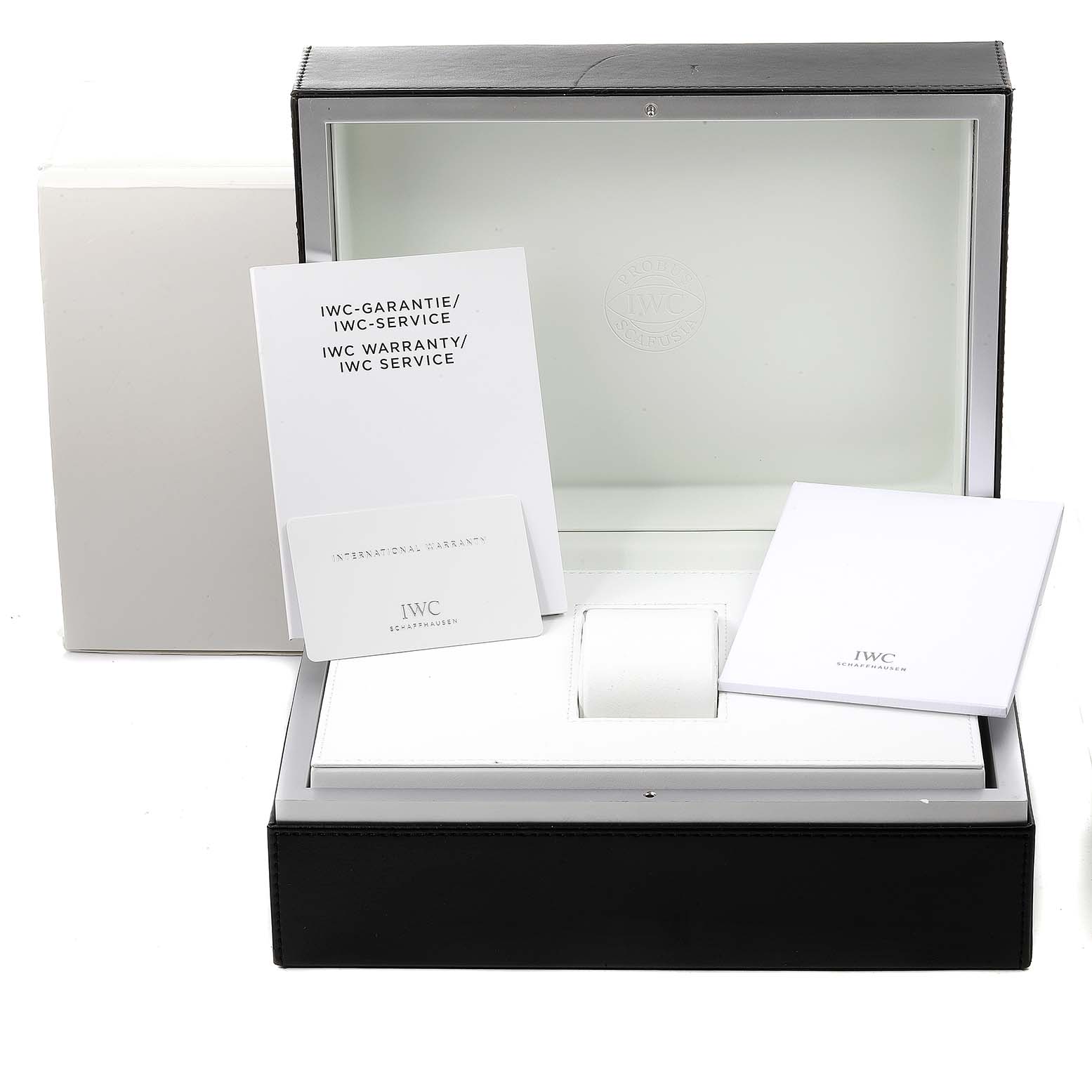 This image shows the box and papers for an IWC Pilot IW389002 Men's Titanium Black Dial IW389002 Men's Titanium Black Dial model watch, including the warranty cards and manuals.