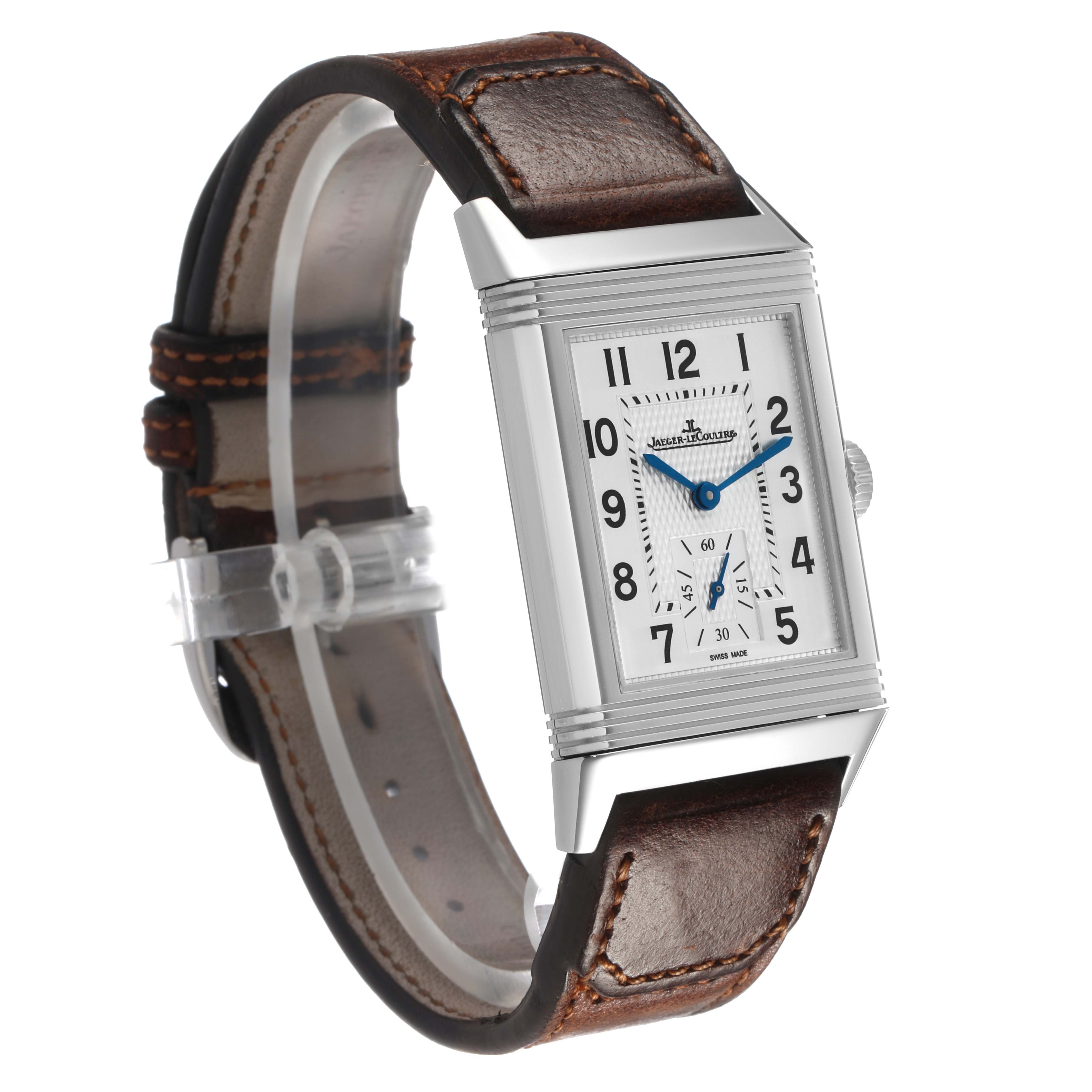 The Jaeger LeCoultre Reverso 214.8.62 / Q3858522 Men's Stainless Steel Silver Dial watch is shown at a side-angle, displaying the rectangular face, crown, and brown leather strap.