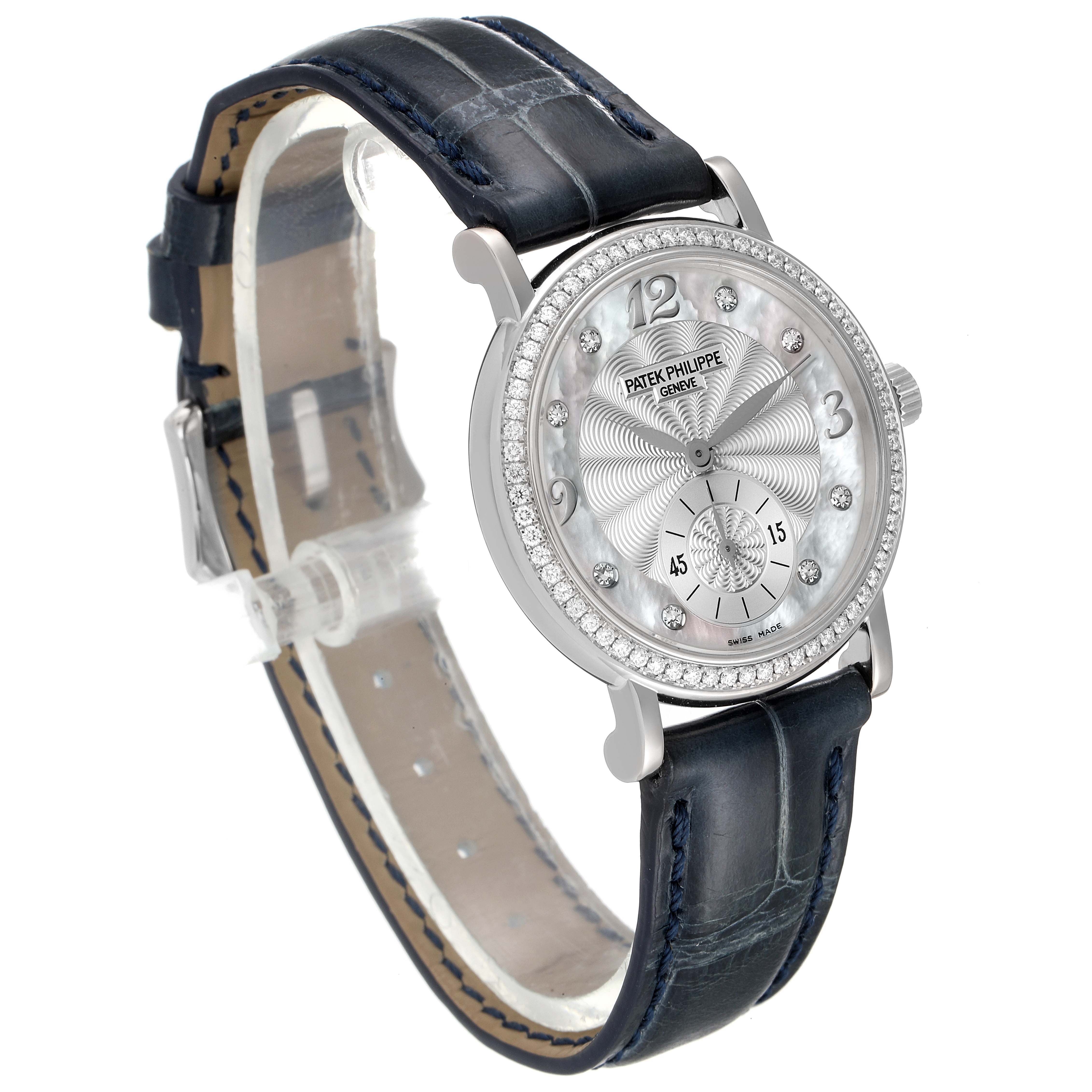 This image shows a side-front view of a Patek Philippe Calatrava 4959G Women's White Gold Mother of Pearl Dial 4959G Women's White Gold Mother of Pearl Dial watch, displaying the dial, bezel, and leather strap.