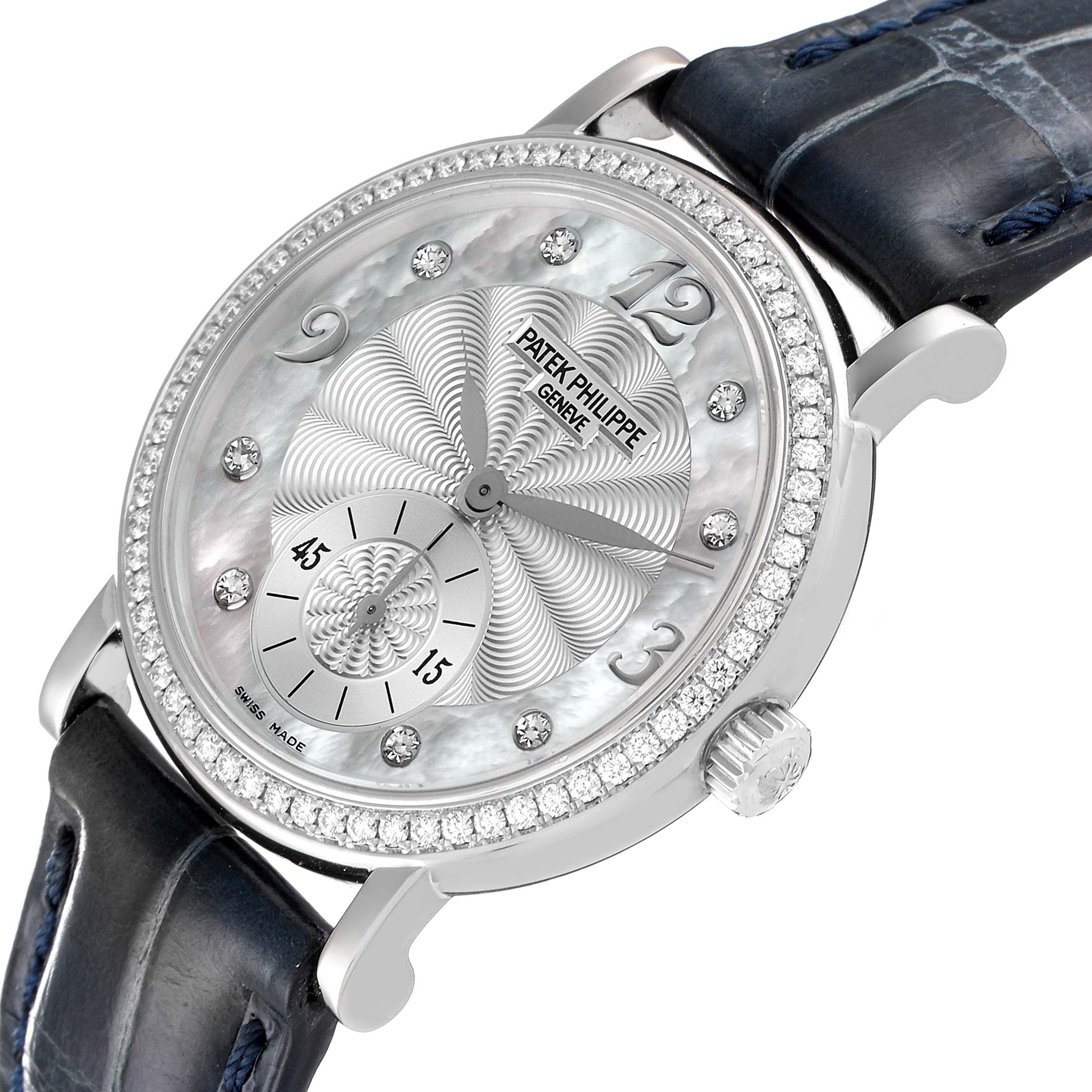 This Patek Philippe Calatrava 4959G Women's White Gold Mother of Pearl Dial 4959G Women's White Gold Mother of Pearl Dial watch is shown in an angled close-up, highlighting the face, bezel, crown, and strap.