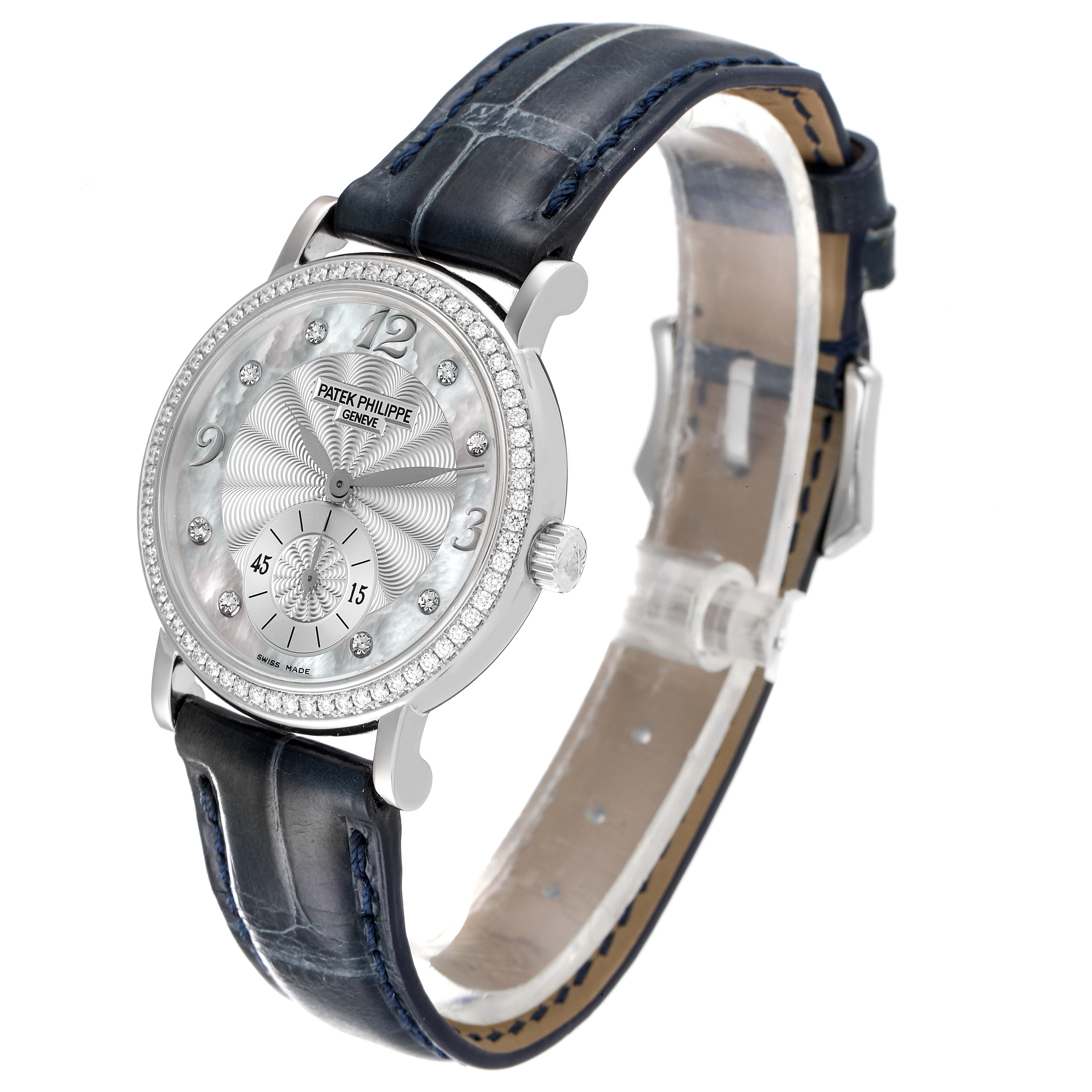 The image shows a Patek Philippe Calatrava 4959G Women's White Gold Mother of Pearl Dial 4959G Women's White Gold Mother of Pearl Dial watch angled from the front-left side, highlighting the face, strap, and crown.