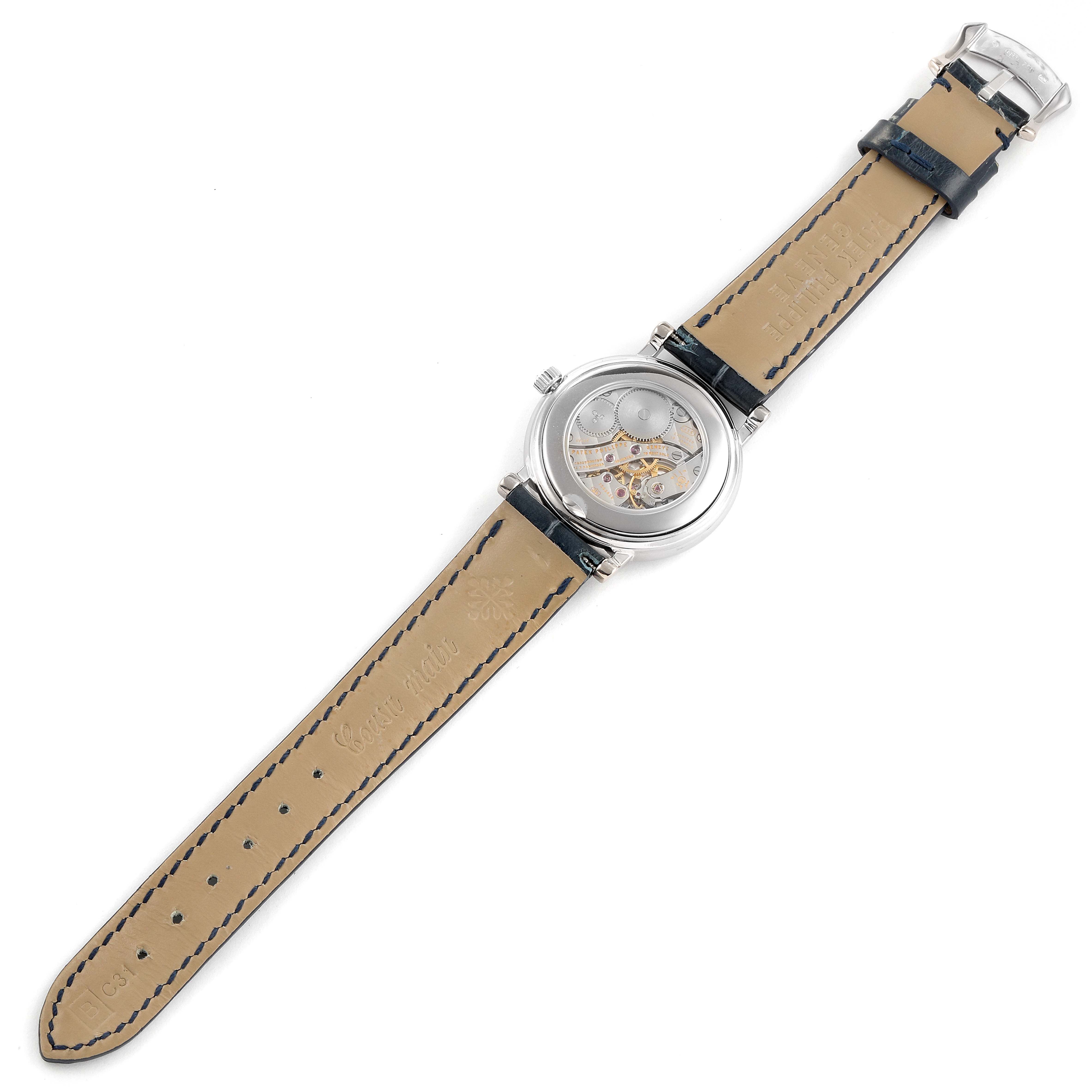 The image shows the back view of a Patek Philippe Calatrava 4959G Women's White Gold Mother of Pearl Dial 4959G Women's White Gold Mother of Pearl Dial watch, displaying its transparent case back and leather strap.