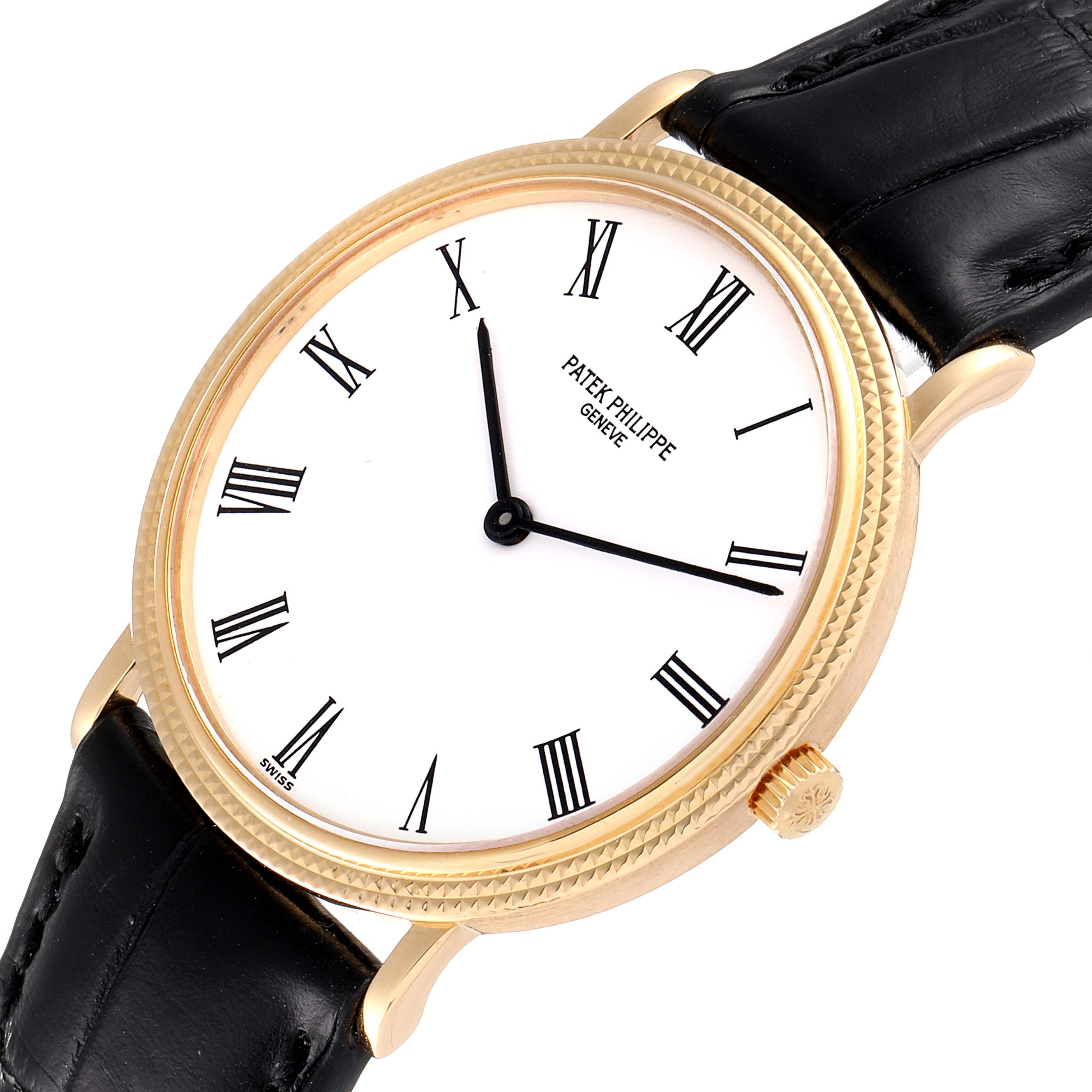 The image shows a top view of a Patek Philippe Calatrava 3954J Men's Yellow Gold White Dial 3954J Men's Yellow Gold White Dial watch, featuring a gold case, white dial, Roman numerals, and a black leather strap.