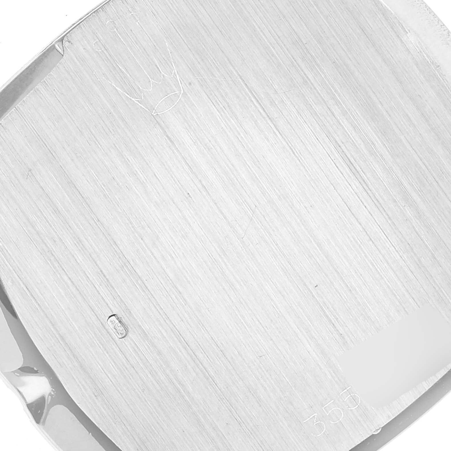 This image shows the back casing of a Rolex Cellini 3805 Men's Stainless Steel Blue Dial 3805 Men's Stainless Steel Blue Dial watch with the brand's logo engraved.