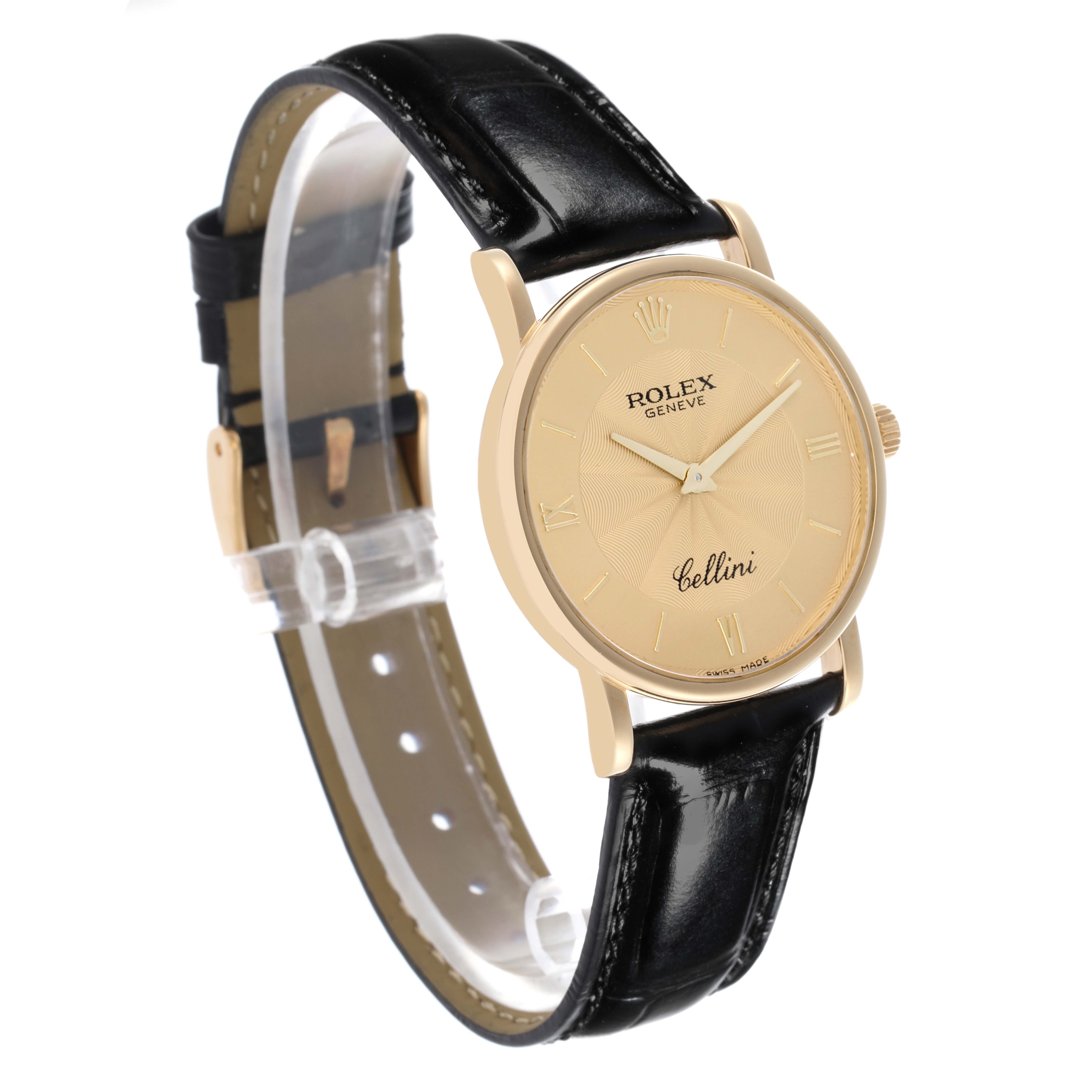 The Rolex Cellini 5115 Men's Yellow Gold Champagne Dial 5115 Men's Yellow Gold Champagne Dial watch is shown from a front angle, highlighting its gold dial, case, and black leather strap.