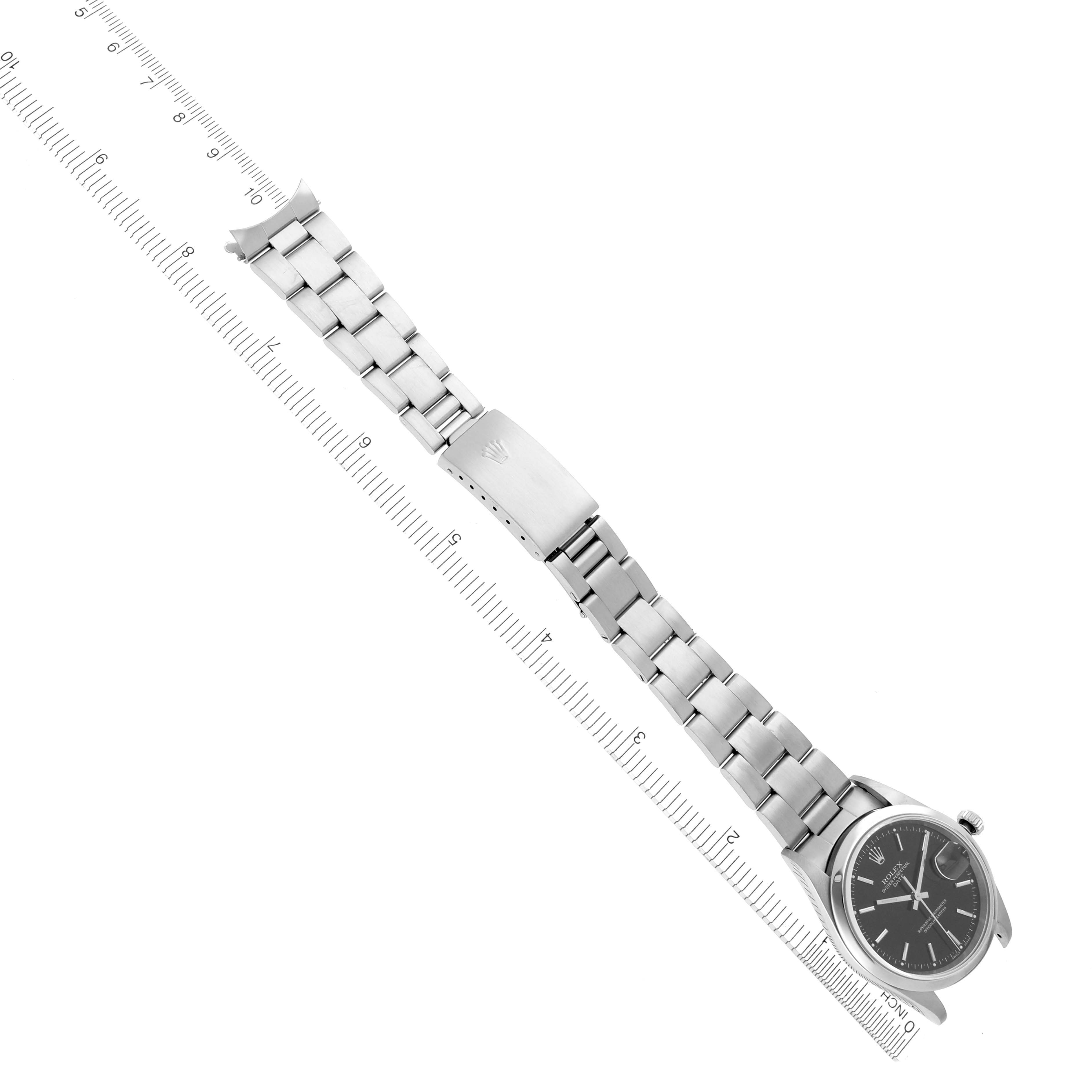 The Rolex Date 15200 Men's Stainless Steel Black Dial 15200 Men's Stainless Steel Black Dial watch is shown from a top-down angle, displaying the full bracelet, clasp, and face.