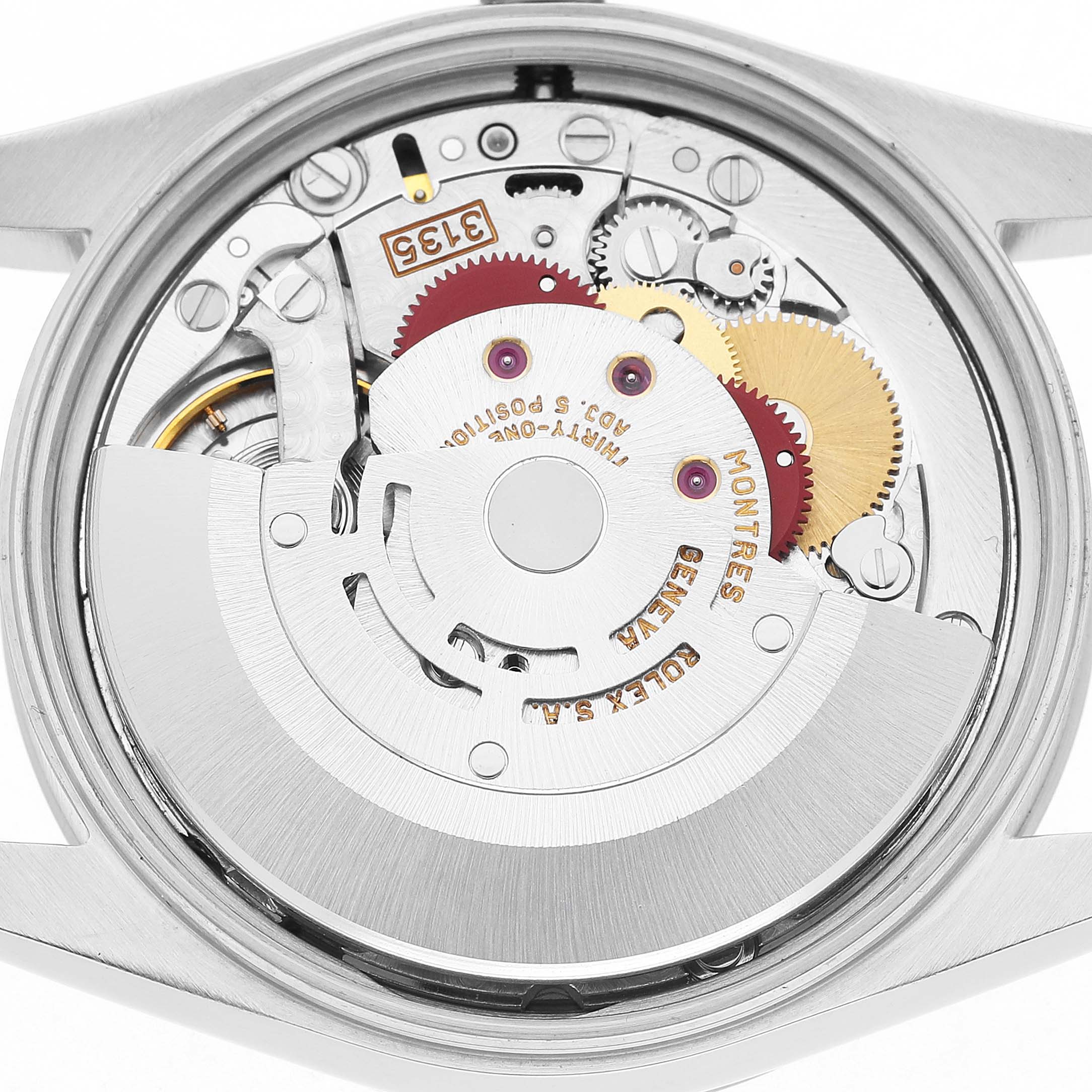 The image shows the movement mechanism of a Rolex Date 15200 Men's Stainless Steel Blue Dial model from the back, highlighting gears and intricate components.