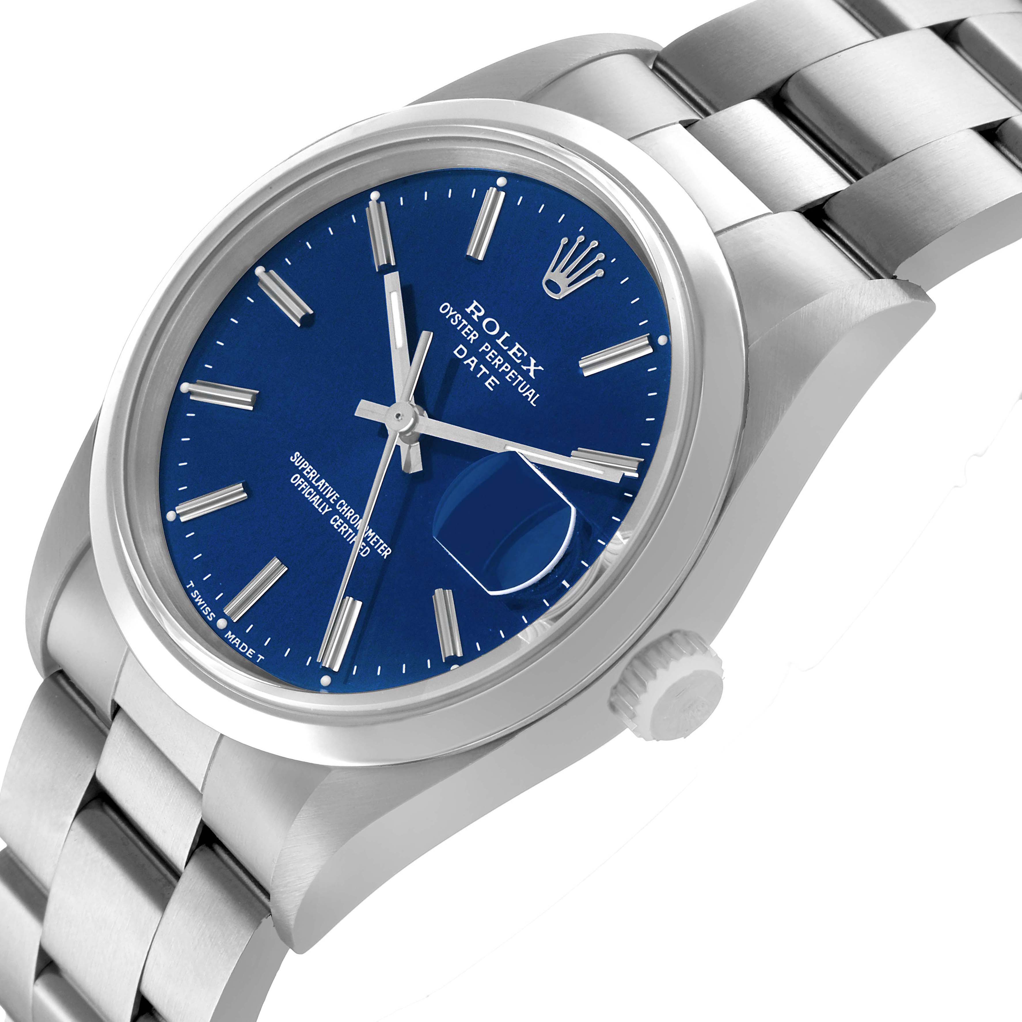 The Rolex Date 15200 Men's Stainless Steel Blue Dial watch is shown from a side angle, revealing the blue dial, crown, and stainless steel bracelet.
