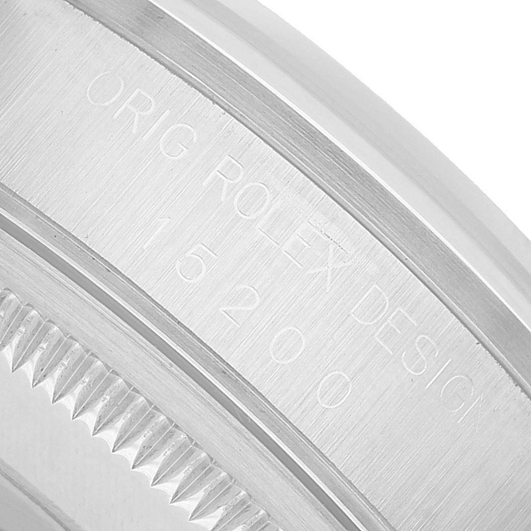 The image shows a close-up of the side casing of a Rolex Date 15200 Men's Stainless Steel Blue Dial model, highlighting the engraving "ORIG ROLEX DESIGN 15200" and the fluted bezel.