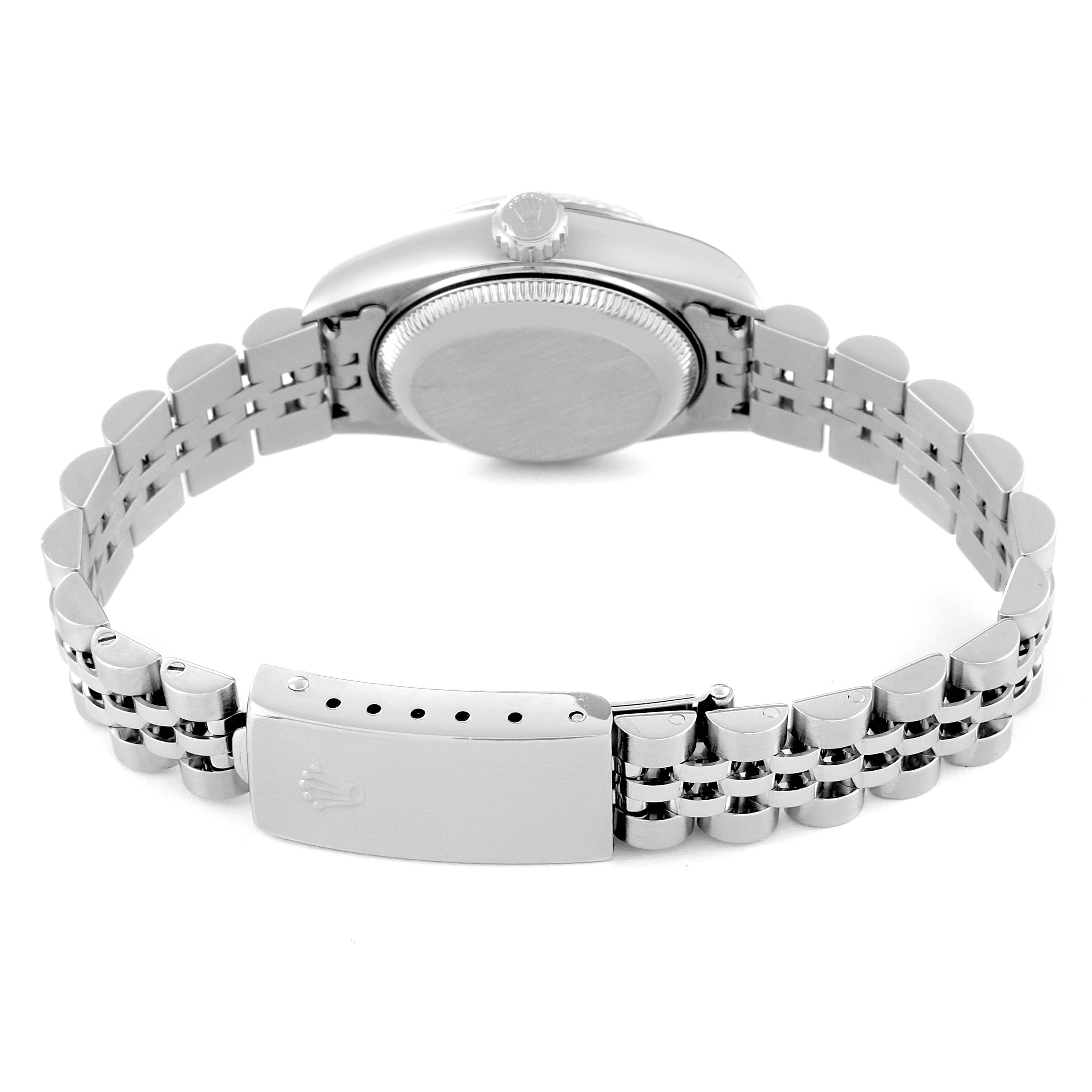 The image shows the back view of a Rolex Datejust 79174 Women's Stainless Steel Silver Dial 79174 Women's Stainless Steel Silver Dial watch, focusing on the caseback, crown, and clasp of the bracelet.