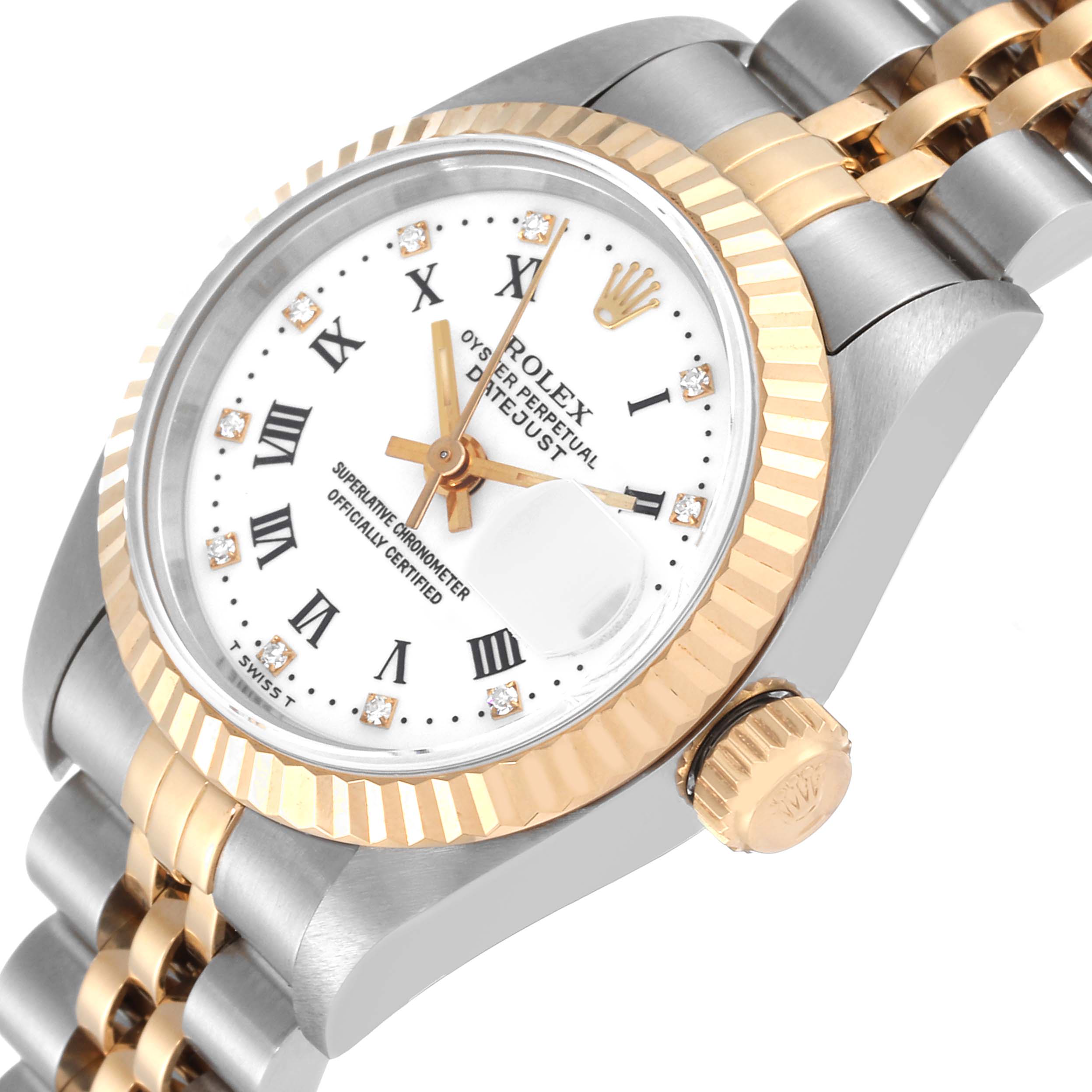 This image shows a close-up angle of the Rolex Datejust 69173 Women's Steel and Gold (two tone) White Dial 69173 Women's Steel and Gold (two tone) White Dial watch, focusing on the dial, bezel, and crown.