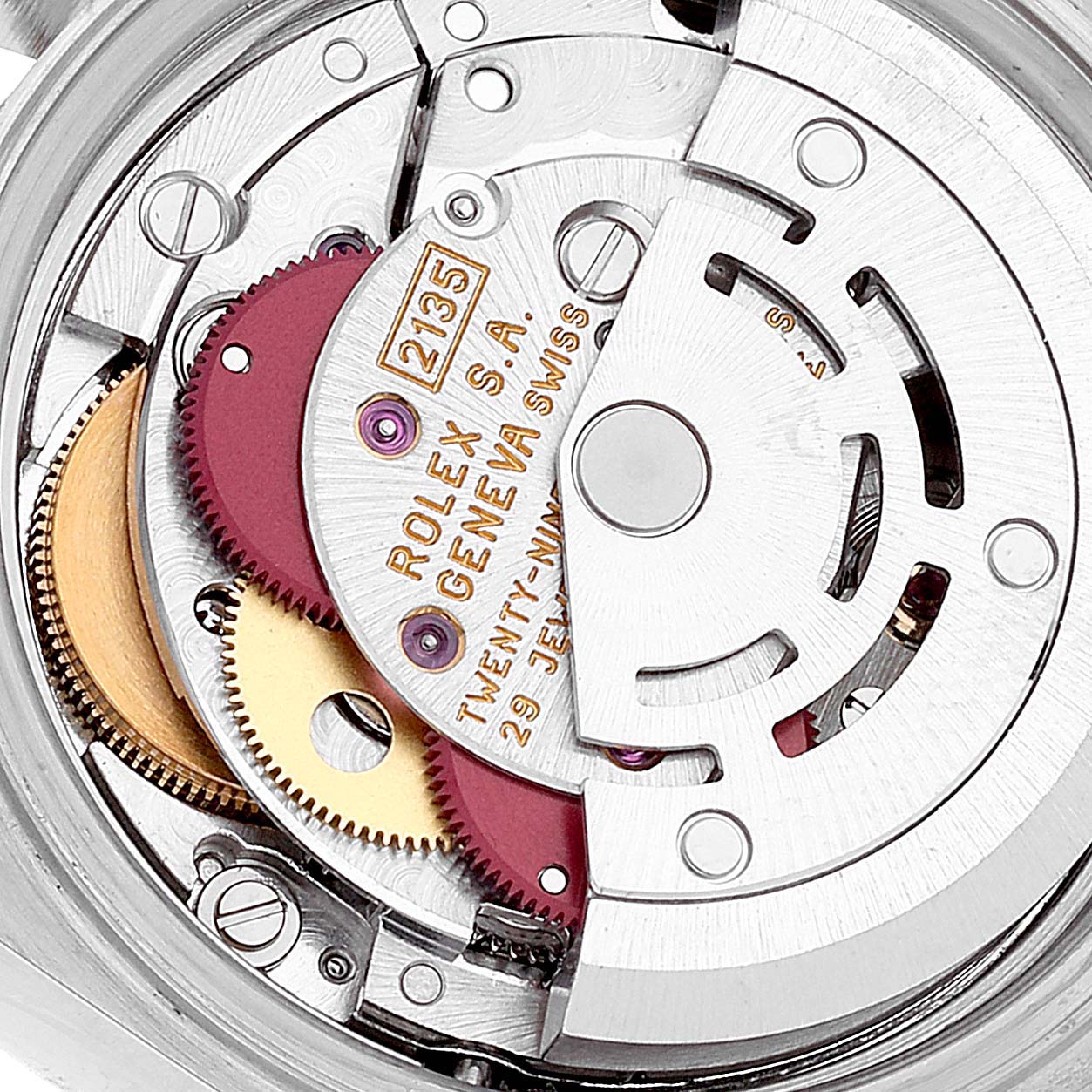 The image shows a close-up view of the inner mechanical movement of a Rolex Datejust 69173 Women's Steel and Gold (two tone) White Dial 69173 Women's Steel and Gold (two tone) White Dial watch, highlighting its intricate gears and components.