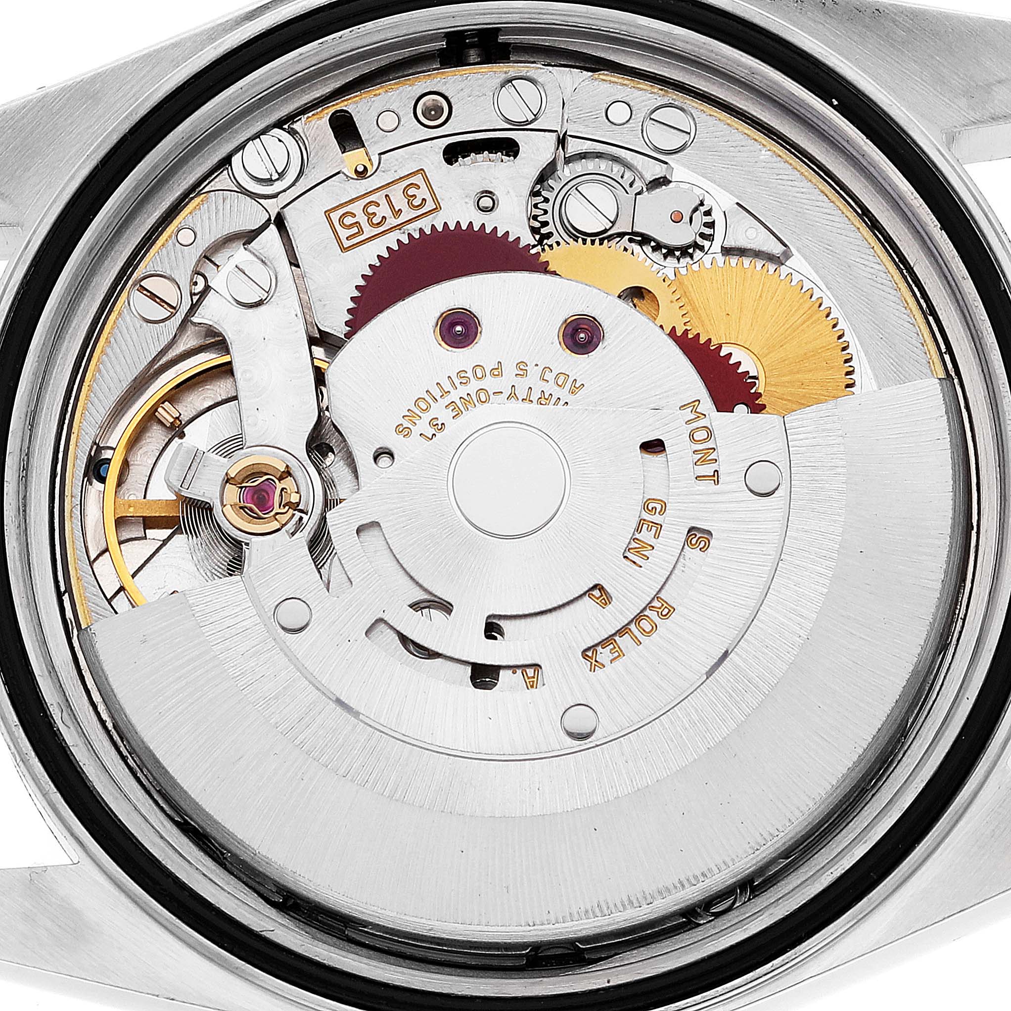 This image shows a close-up view of the movement inside a Rolex Datejust 16234 Men's Stainless Steel Silver Dial 16234 Men's Stainless Steel Silver Dial watch, displaying its intricate mechanical parts.
