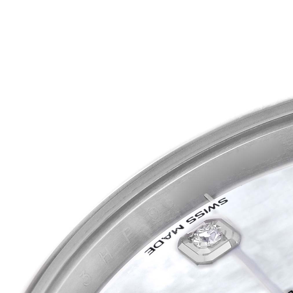 The image shows a close-up of the edge of the Rolex Datejust 41 126334 Men's Stainless Steel Mother of Pearl Dial dial with "Swiss Made" text and a diamond marker.