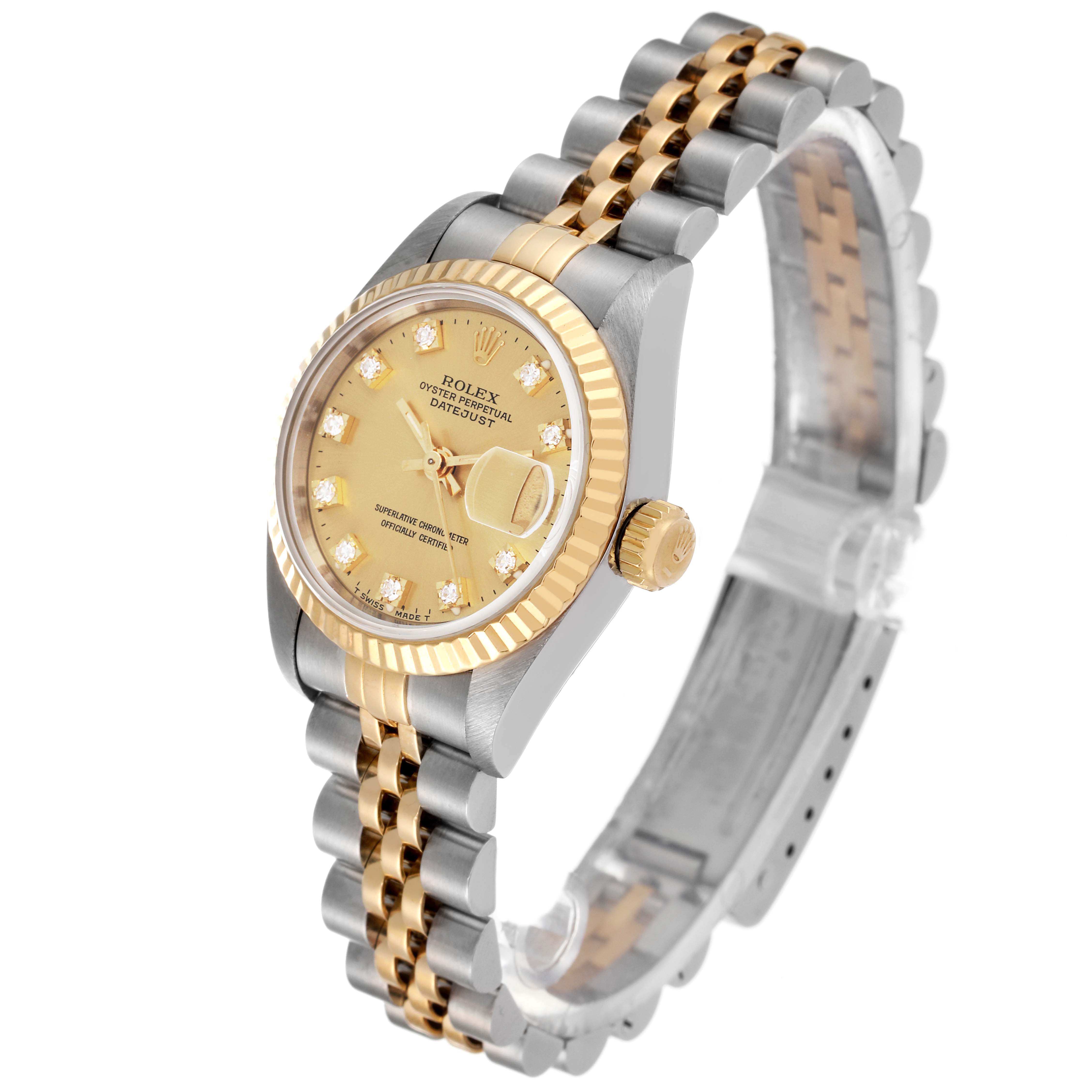 The Rolex Datejust 69173 Women's Steel and Gold (two tone) Champagne Dial 69173 Women's Steel and Gold (two tone) Champagne Dial watch is shown at an angled view, highlighting the gold dial, fluted bezel, and two-tone bracelet.