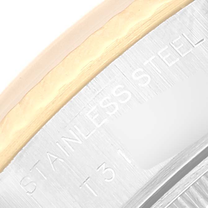 This close-up image shows the side of the Rolex Datejust 69173 Women's Steel and Gold (two tone) Champagne Dial 69173 Women's Steel and Gold (two tone) Champagne Dial watch, highlighting the stainless steel and gold components.